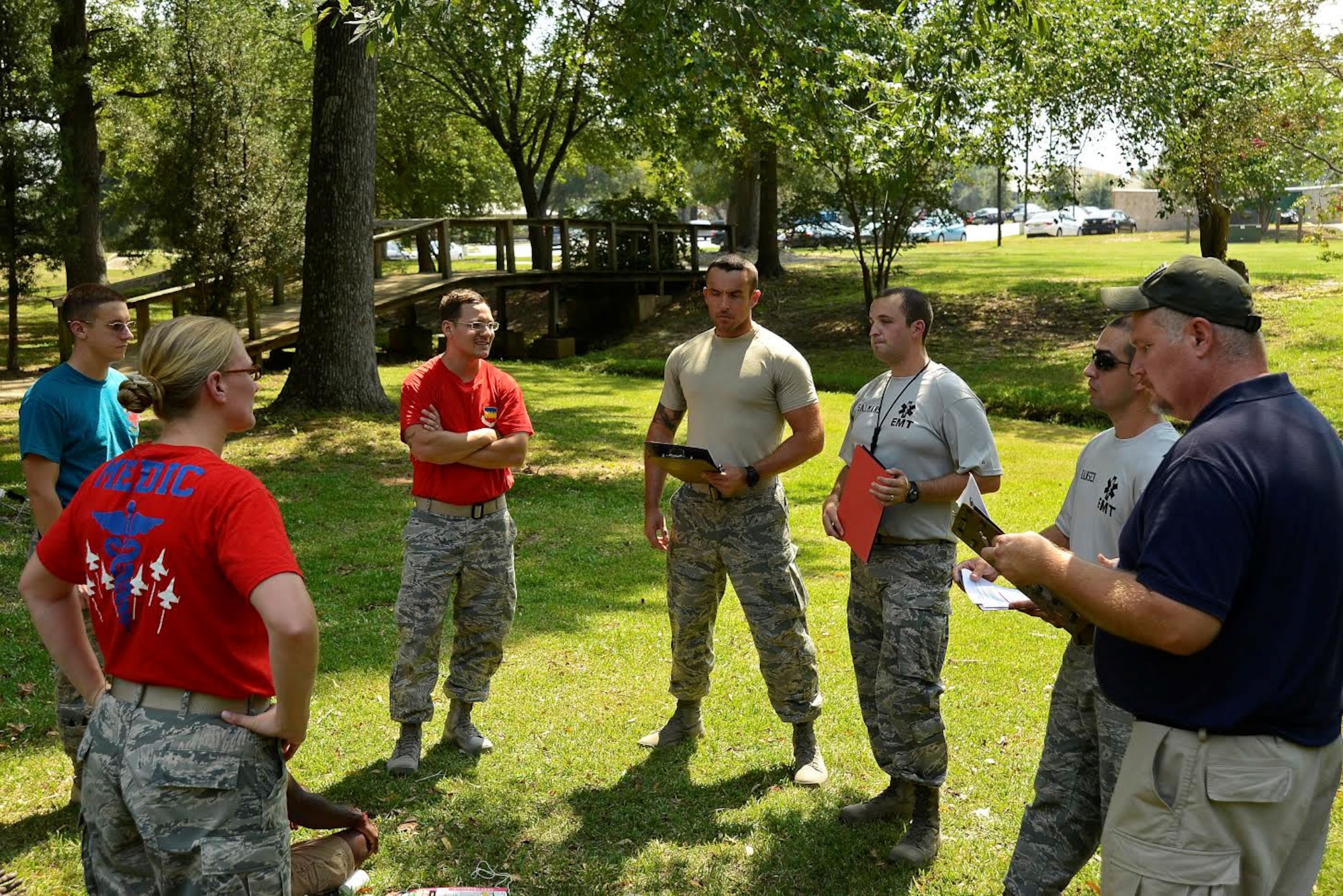 U.S. Airmen from the 20th Medical Operations Squadron are evaluated on how well they performed during the 1st Annual Medic Games at Shaw Air Force Base, S.C., Sept. 9, 2016. Performing exercises as a team helps MDOS Airmen improve their skills and learn to balance tasks amongst each other. (U.S. Air Force photo by Airman BrieAnna Stillman)  