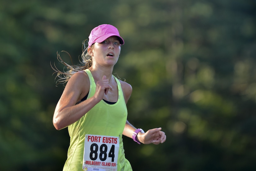Samantha Popovich runs in the Mulberry Island Half Marathon at Joint Base Langley-Eustis, Va., Sept. 17, 2016. Popovich was the first woman to finish overall with a time of 01:34:09. (U.S. Air Force photo by Staff Sgt. Natasha Stannard/Released)