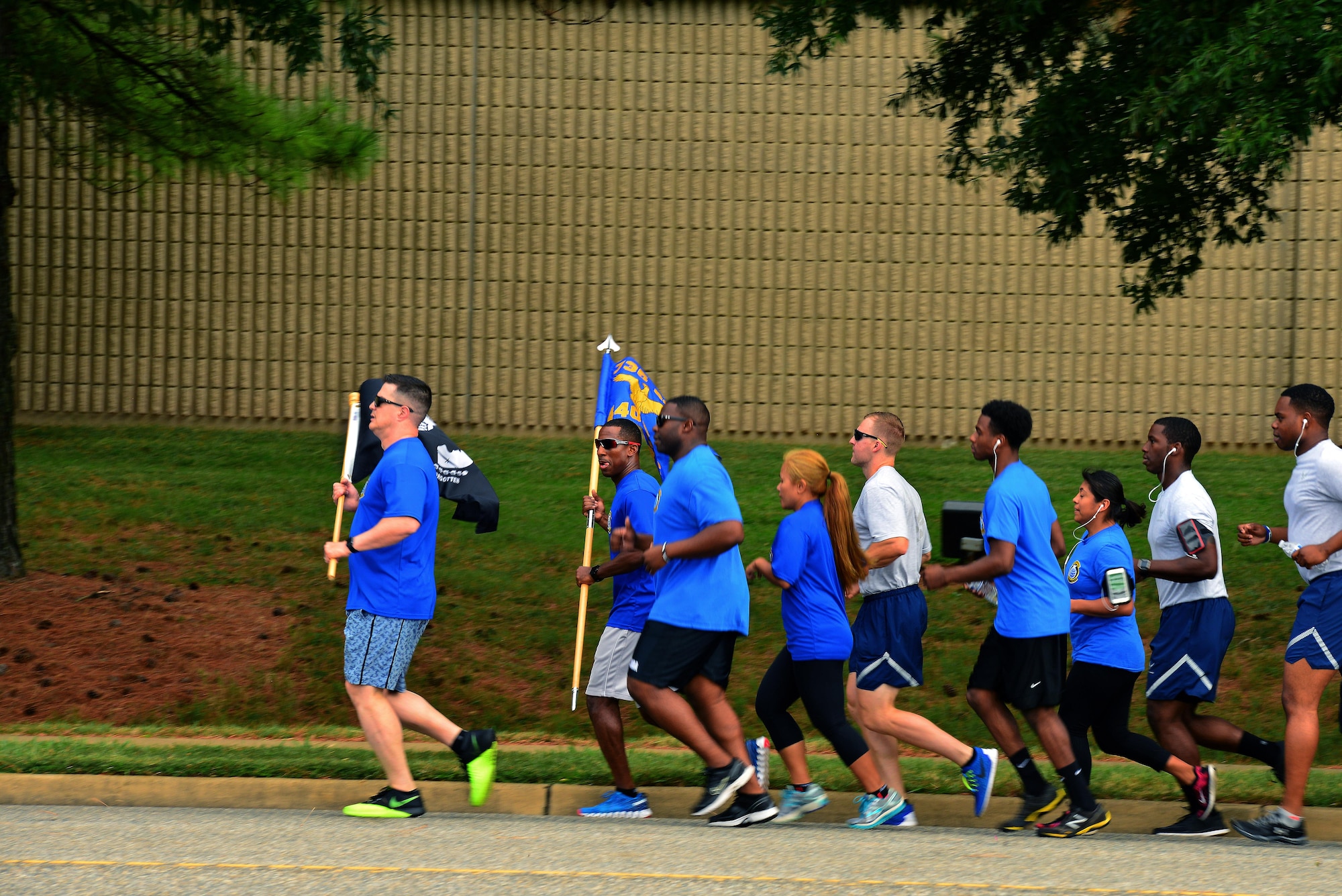 The 440th Supply Chain Operations Squadron start the POW/MIA ceremony 24-hour run at Joint Base Langley-Eustis, Va., Sept. 15, 2016. The POW/MIA flag has flown on National POW/MIA Recognition Day since 1982. (U.S. Air Force photo by Airman 1st Class Tristan Biese)