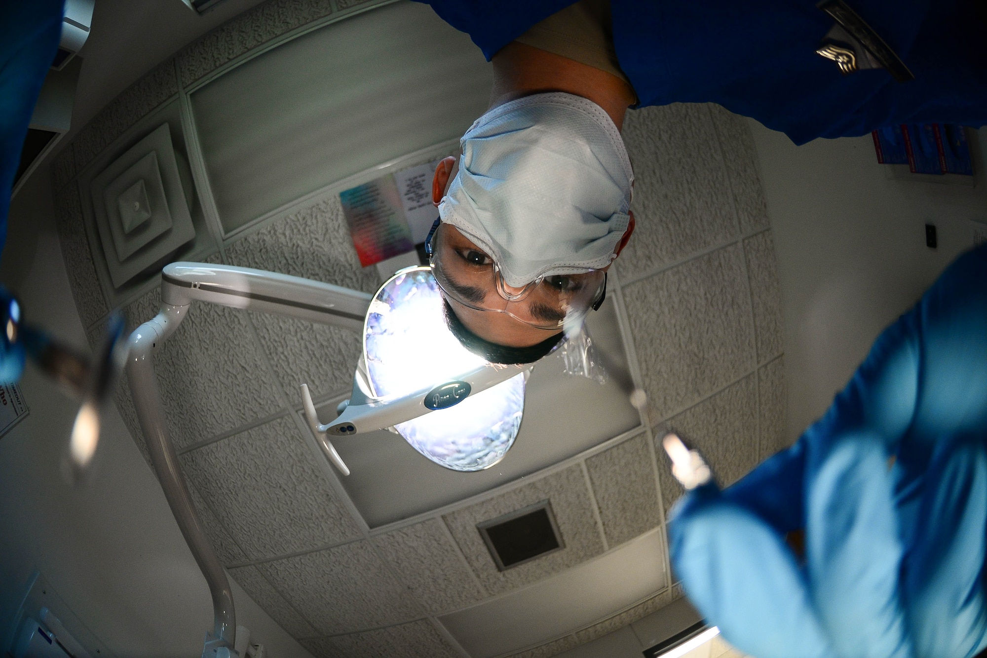 Staff Sgt. David Tierney, 2nd Dental Squadron dental technician, demonstrates what it’s like to receive dental care at Barksdale Air Force Base, La., Sept. 14, 2016. The 2nd DS provides care for Team Barksdale's dental needs ranging from oral surgery, dental x-rays and dental hygiene. (U.S. Air Force photo/Senior Airman Luke Hill)