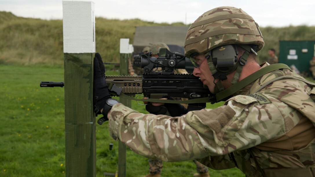 A Royal Marine fires a SA80 A2 rifle, Sept. 13, 2016, at Altcar Training Camp, Merseyside, England. The Marines are participating in the Royal Marines Operational Shooting Competition from Sept. 6-22, 2016.  The Royal Marines are competing against the Royal Netherlands Marine Corps and the U.S. Marines.