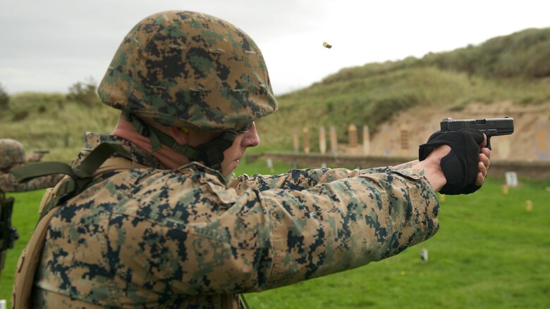 Sgt. Chris Anderson, a competitor with the Marine Corps Shooting Team, fires a Glock 17 at a practice match during the Royal Marines Operational Shooting Competition, Sept. 12, 2016, at Altcar Training Camp, Merseyside, England. The competition is from September 6 - 22, 2016.  The U.S. Marines are competing against and building bonds with the Royal Netherlands Marine Corps and the Royal Marines. Anderson is with Weapons Training Battalion, Marine Corps Base Quantico, Virginia.