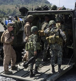 Philippine Marines board a U.S. Marine Corps Amphibious Assault Vehicle with Combat Assault Battalion, 3rd Marine Division, III Marine Expeditionary Force during Balikatan 16 at Crow Valley, Philippines, April 4, 2016. This training familiarized the Philippine Marines with the capabilities of the AAV employed by the U.S. Marines. Through our enduring partnership, the U.S. and Philippines are postured to rapidly deploy in response to real world crises across the military spectrum from natural disasters to conflict throughout the Indo-Asia-Pacific region. 