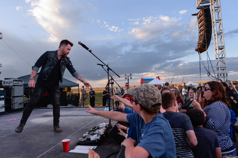 David Cook interacts with the audience during his concert at Schriever Air Force Base, Colorado, Friday, Sept. 16, 2016. The concert was part of the Air Force Concert Series, which included 11 other installations. (U.S. Air Force photo/Christopher DeWitt)