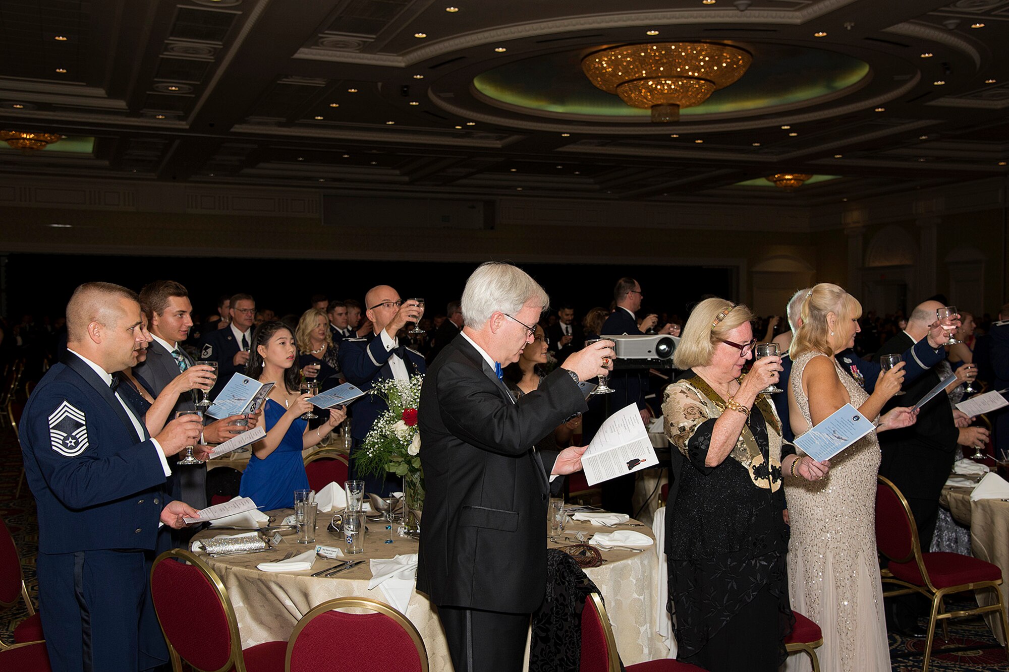 Members of Team Dover raise their glasses for the ceremonial toast during the Air Force Ball Sept. 17, 2016, at Dover Downs in Dover, Del. The ball celebrated the day the Air Force became its own branch of service, 69 years ago. (U.S. Air Force photo by Senior Airman Aaron J. Jenne)