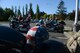Service members and retirees gather at Memorial Grove Sept. 13, 2016, on Joint Base Lewis-McChord, Wash. In recognition of Prisoner of War/Missing in Action Remembrance Week, members of the armed forces participated in an annual POW/MIA motorcycle ride to show support for those who served and are not forgotten. (U.S. Air Force photo/Senior Airman Divine Cox) 