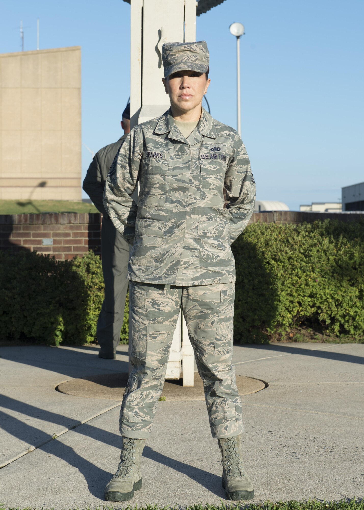 Chief Master Sgt. Sarah Sparks, 436th Airlift Wing command chief, stands during a vigil in acknowledgement of National POW/MIA Recognition Day Sept. 16, 2016, at the base flagpole on Dover Air Force Base, Del. Team Dover Airmen took shifts standing in the vigil at the flagpole throughout the day. (U.S. Air Force photo by Senior Airman Zachary Cacicia)