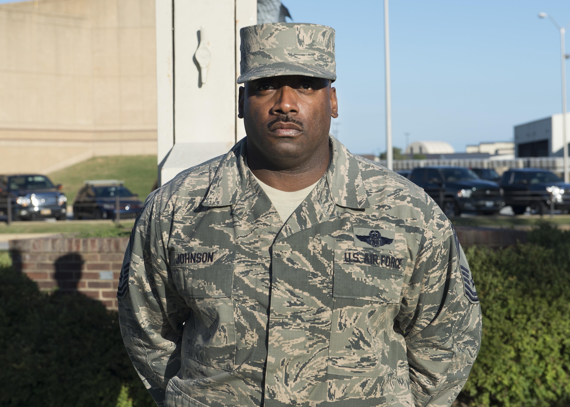 Chief Master Sgt. Robert Johnson, 436th Operations Group superintendent, stands during a vigil in acknowledgement of National POW/MIA Recognition Day Sept. 16, 2016, at the base flagpole on Dover Air Force Base, Del. Johnson, along with three other group chiefs stood vigil for 10 minutes. (U.S. Air Force photo by Senior Airman Zachary Cacicia)