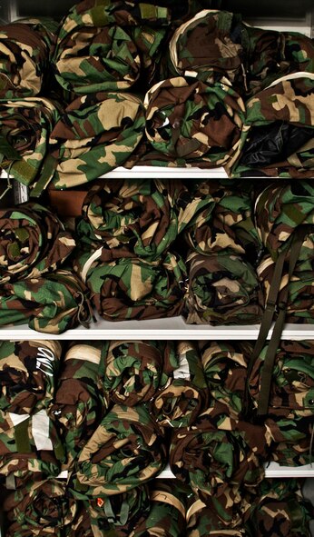 Rows of deployment gear rest on the shelves in the Individual Protective Equipment shop at Minot Air Force Base, N.D., Sept. 6, 2016. The IPE shop issues out two to three sets of deployment training gear each day. (U.S. Air Force photo/Airman 1st Class Jonathan McElderry)