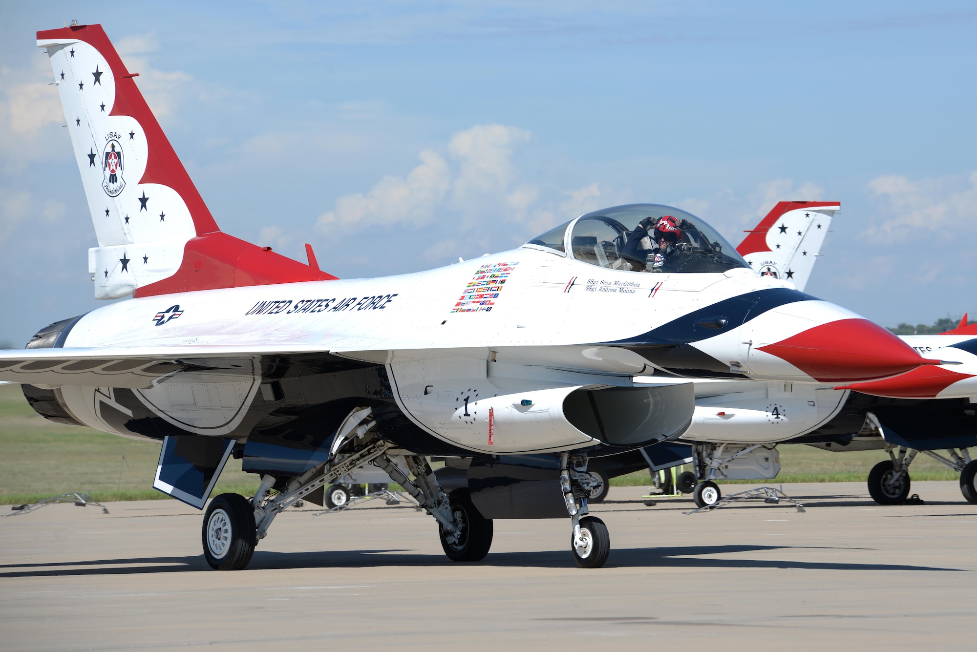 U.S. Air Force Thunderbird Commander, Lt. Col. Christopher Hammond, waves as he taxis for take-off on Sheppard Air Force Base, Texas, Sept. 17, 2016. Hammond and his team of Thunderbirds performed various aerial acrobatic demonstrations for Sheppard’s 75th Anniversary Air Show Celebration. (U.S. Air Force photo by Senior Airman Kyle E. Gese)