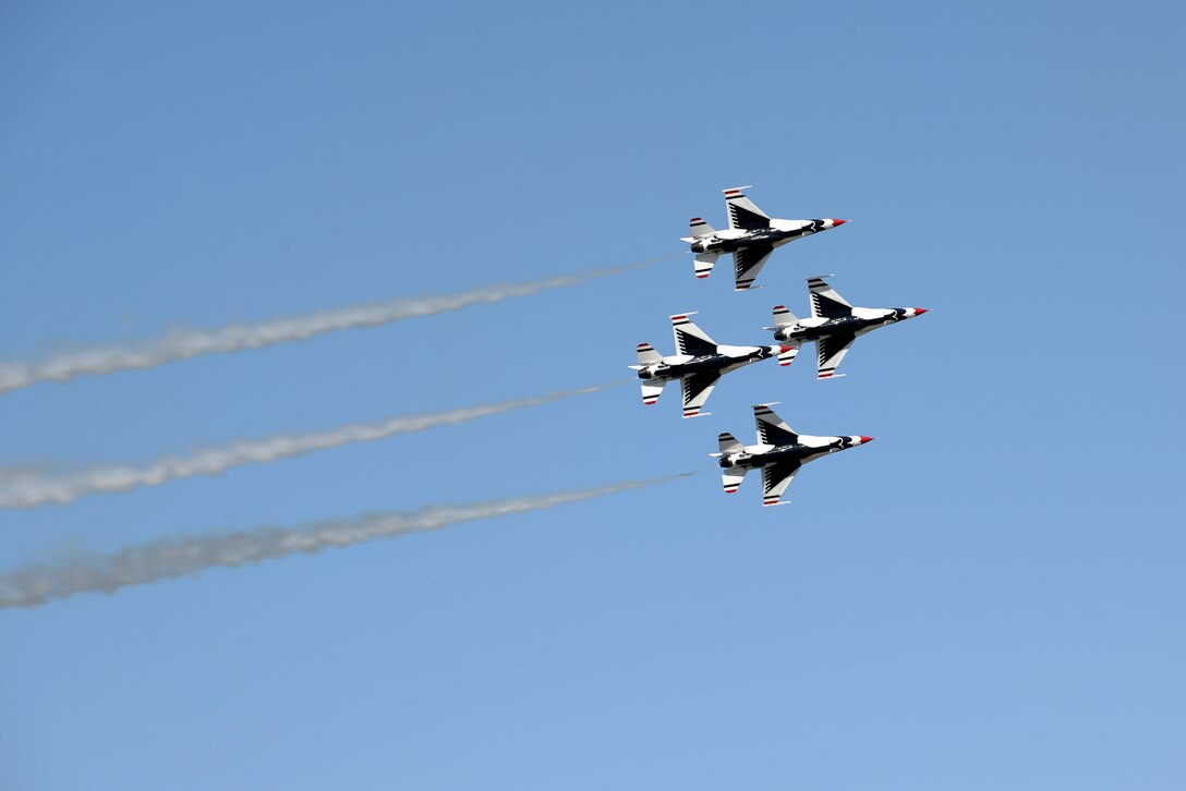 Four of the six U.S. Air Force Thunderbirds fly in a close air formation during the Sheppard Air Force Base, Texas, 75th Anniversary Air Show Celebration, Sept. 17, 2016. The Thunderbirds showcase the skill and precision of the brave aviators, maintenance and support Airmen who deploy abroad to defend our nation and its allies. (U.S. Air Force photo by Senior Airman Kyle E. Gese)