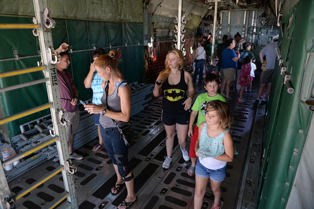 People from Wichita Falls and neighboring communities tour the different aircraft during the 75th Anniversary Air Show Celebration at Sheppard Air Force Base, Texas, Sept. 18, 2016. The celebration had numerous performers such as the Tora Tora Tora Pearl Harbor reenactment, the Air Force Wings of Blue, skydiver Dana Bowman, Viper Air Show jet car and solo demo, Randy Ball’s Mig 17 and Vietnam T-37 demo, Kent Pietsch Jelly Belly comedy air act, Texas Raiders B-17 WWII demo, Freedom Flyers P-51 WWII demo, and the world-famous U.S. Air Force Thunderbirds. (U.S. Air Force photo by Senior Airman Kyle E. Gese)