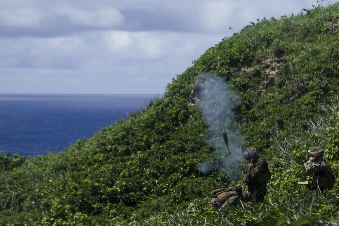 Mortarmen with Weapons Company, Battalion Landing Team, 2nd Battalion, 4th Marine Regiment, 31st Marine Expeditionary Unit, fire an 81 mm mortar during training on Farallon de Medinilla Range, Commonwealth Northern Mariana Islands, Sept. 16, 2016. The mortarmen fired nearly 100 81 mm mortar rounds during training on the uninhabited targeting range as part of Valiant Shield 16. Valiant Shield 16 is a biennial field training exercise designed to develop the integration of joint U.S. forces. The training enables real-world proficiency of joint forces to detect, locate, track and engage units – at sea, in the air, on land, and in cyberspace – to prepare for a range of possible military operations.