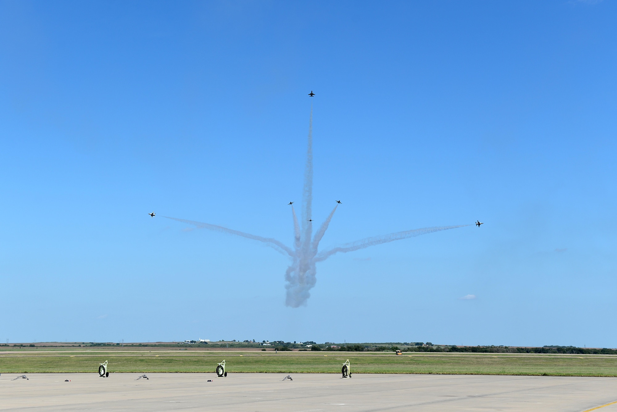 The U.S. Air Force Thunderbirds perform their delta burst formation during the Sheppard Air Force Base, Texas, 75th Anniversary Air Show Celebration, Sept. 17, 2016. The Thunderbirds showcase the skill and precision of the brave aviators, maintenance and support Airmen who deploy abroad to defend our nation and its allies. (U.S. Air Force photo by Senior Airman Kyle E. Gese)