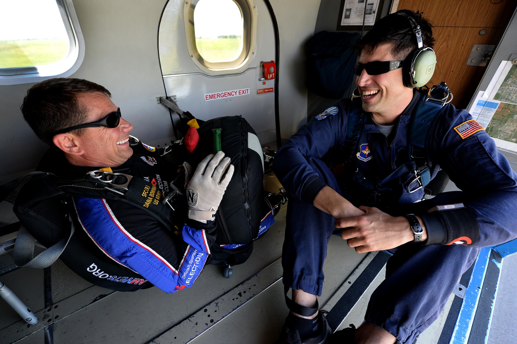 Dana Bowman, retired sergeant first class with the U.S. Army and well-renowned skydiver, and Tech Sgt. Trevor Veitz, U.S. Air Force Wings of Blue jump master, prepares to jump from UV-18B Twin Otter aircraft with the during the Sheppard Air Force Base, Texas, practice air show, Sept. 16, 2016. Bowman jumped along with the Air Force team to open the 75th Anniversary Air Show celebration. (U.S. Air Force photo by Senior Airman Kyle E. Gese)