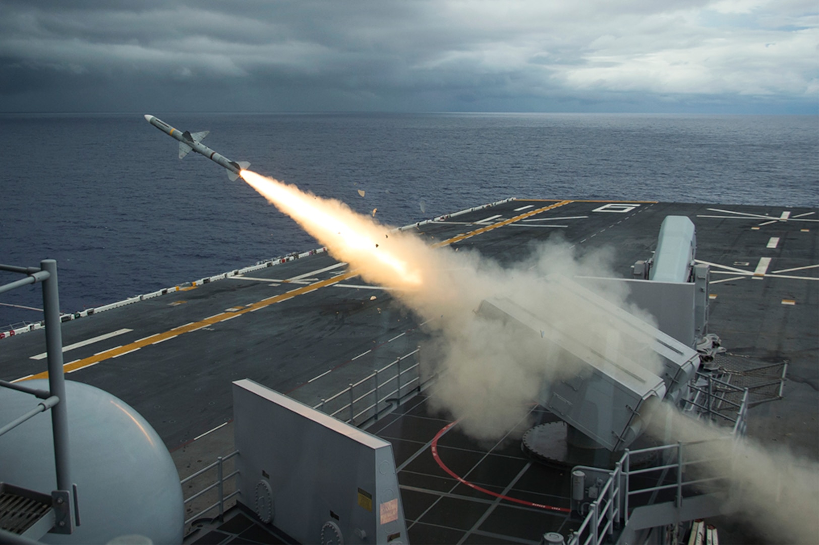 Amphibious assault ship USS Bonhomme Richard (LHD 6) fires a NATO Sea Sparrow surface-to-air missile to intercept a remote-controlled drone as part of Valiant Shield 2016 (VS16). VS16 is a biennial, U.S.-only, field training exercise (FTX) with a focus on integration of joint training among U.S. forces. This training enables real-world proficiency in sustaining joint forces through detecting, locating, tracking and engaging unity at sea, in the air, on land, and in cyberspace in response to a range of mission areas. Bonhomme Richard, flagship of the Bonhomme Richard Expeditionary Strike Group, is operating in the Philippine Sea in support of security and stability in the Indo-Asia Pacific region. 