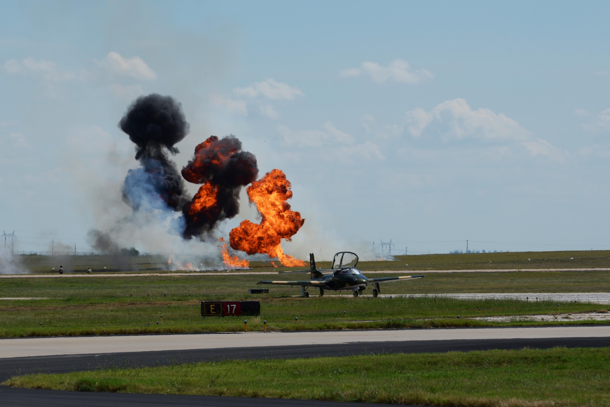 Tora Tora Tora lights up the runway during the 75th Anniversary Air Show at Sheppard Air Force Base, Texas, Sept. 17, 2016. Tora Tora Tora is a demonstration team that recreates the Dec. 7, 1941, attack on Pearl Harbor. (U.S. Air Force photo by Senior Airman Kyle E. Gese)