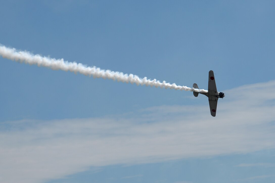 A Tora Tora Tora Mitsubishi A6M Japanese WWII attack plane flies in to light up the runway on Sheppard Air Force Base, Texas, during the 75th Anniversary Air Show, Sept. 17, 2016. The motto of this demonstration team is “Lest We Forget,” and serves as a memorial for both sides who gave their lives for their countries. (U.S. Air Force photo by Senior Airman Kyle E. Gese)