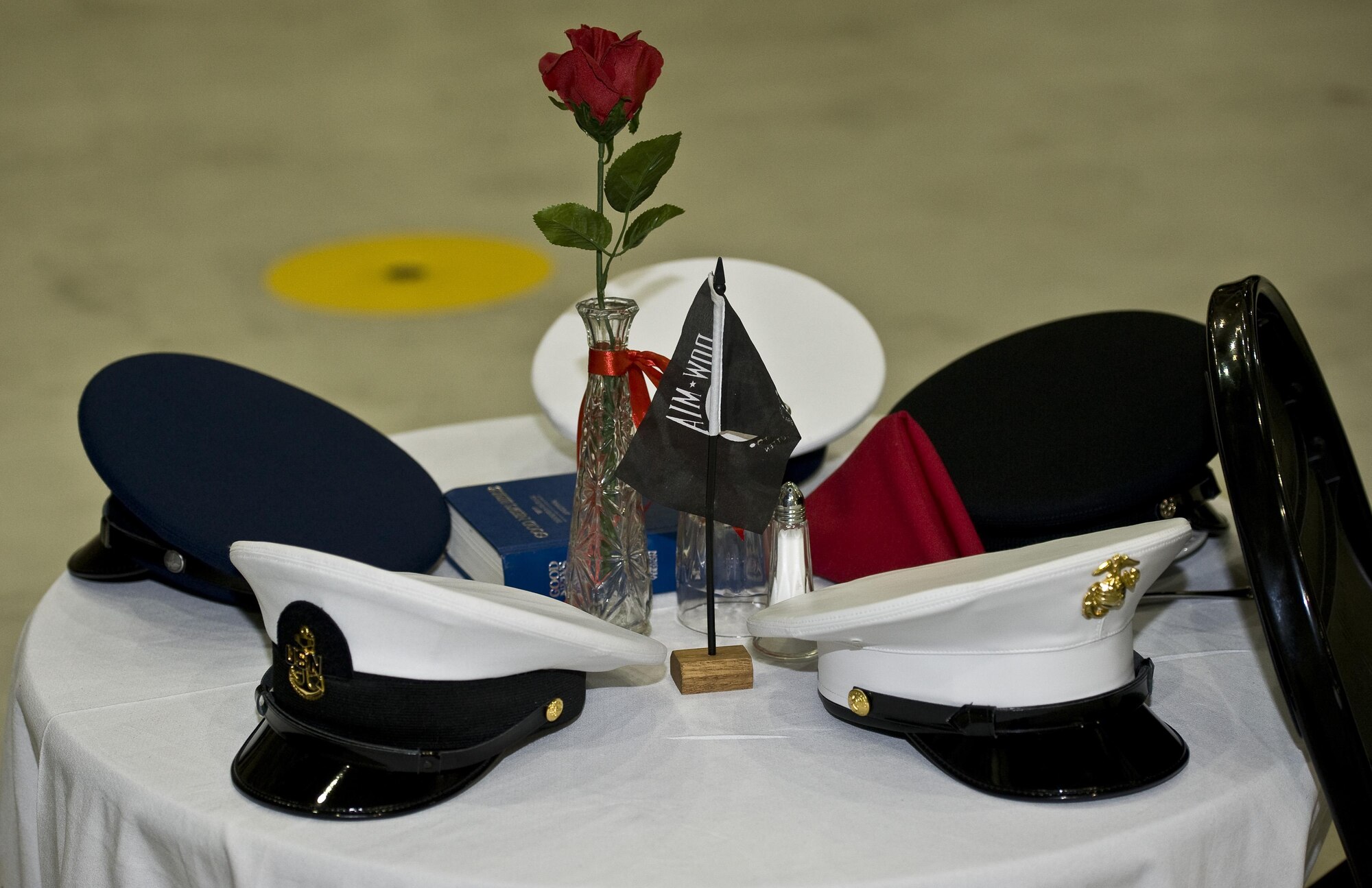 A memorial for Prisoner of War/Missing in Action is displayed during the 2016 Air Force Ball at Minot Air Force Base, N.D., Sept. 17, 2016. This memorial was recognized during a presentation by the Minot AFB Honor Guard. (U.S. Air Force photo/Airman 1st Class Jonathan McElderry)