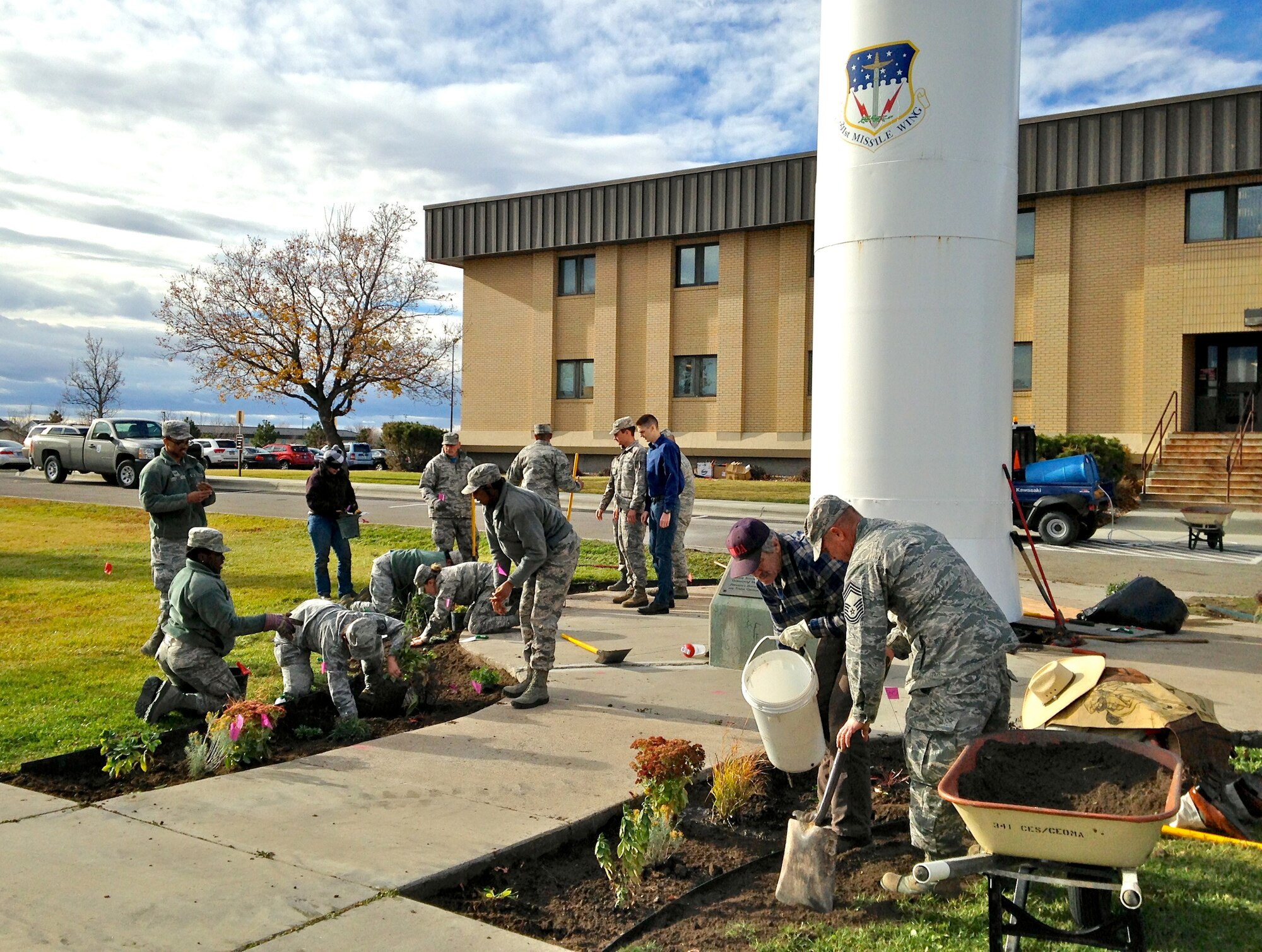 341st Force Support Squadron Airmen, U.S. Fish and Wildlife Services and volunteers help plant a pollinator garden Oct. 31, 2015, at Malmstrom Air Force Base. The 341st Civil Engineer Squadron environmental section was deemed the best in the Air Force and was notified of their win of the 2016 Gen. Thomas D. White National Resources Conservation Award in late February. (Courtesy photo)