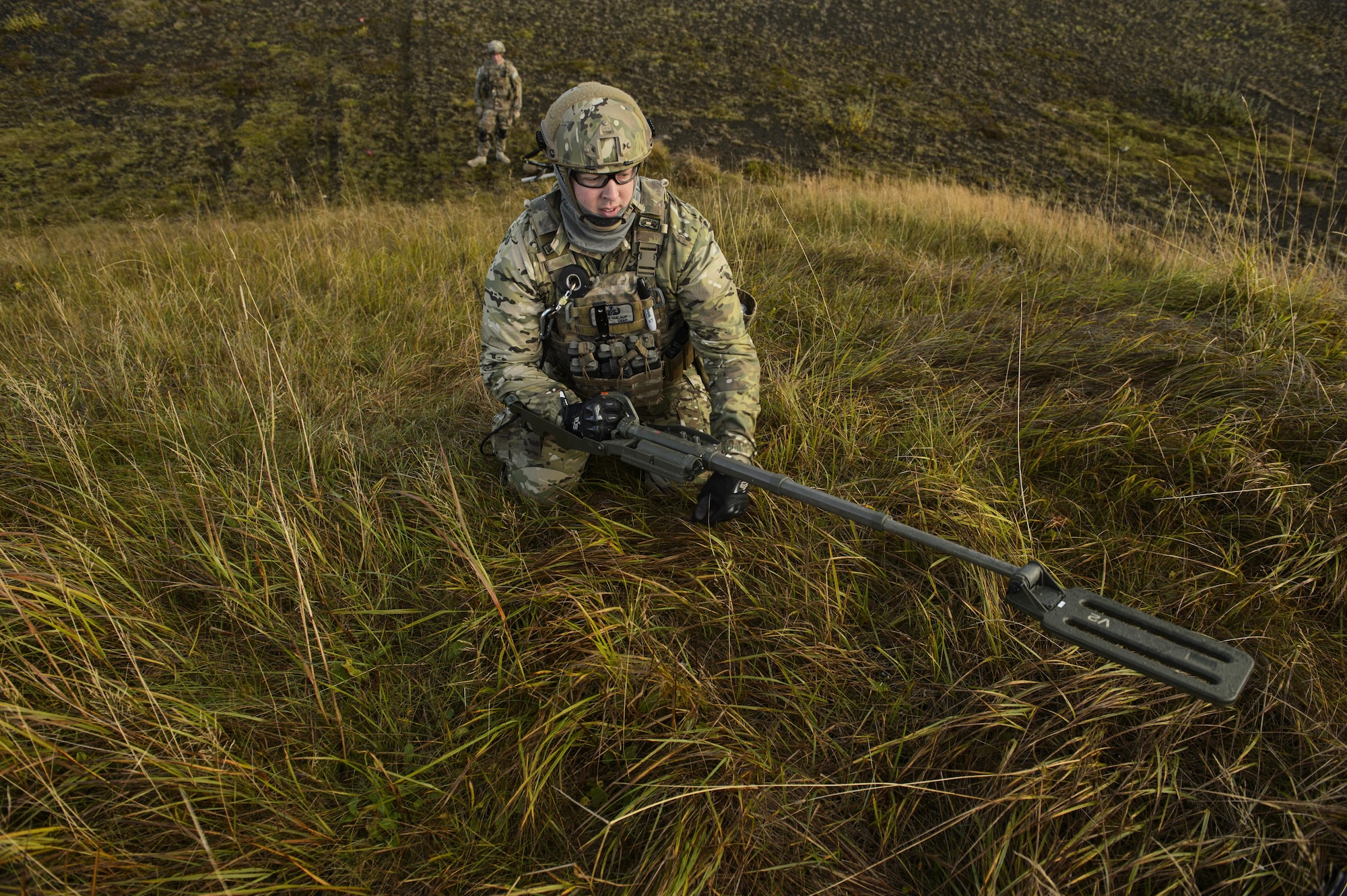 U.S. Air Force Tech. Sgt. Jason Umlauf, 52nd Civil Engineer Squadron explosive ordnance disposal craftsman, Spangdahlem Air Base, Germany, sweeps an area with a mine detector during Northern Challenge 16 exercise at Icelandic Coast Guard Keflavik Facility, Iceland, Sept. 19, 2016. The exercise focused on disabling improvised explosive devices in support of counter-terrorism tactics to prepare Partnership for Peace, NATO, and Nordic nations for international deployments and defense against terrorism. (U.S. Air Force photo by Staff Sgt. Jonathan Snyder)             