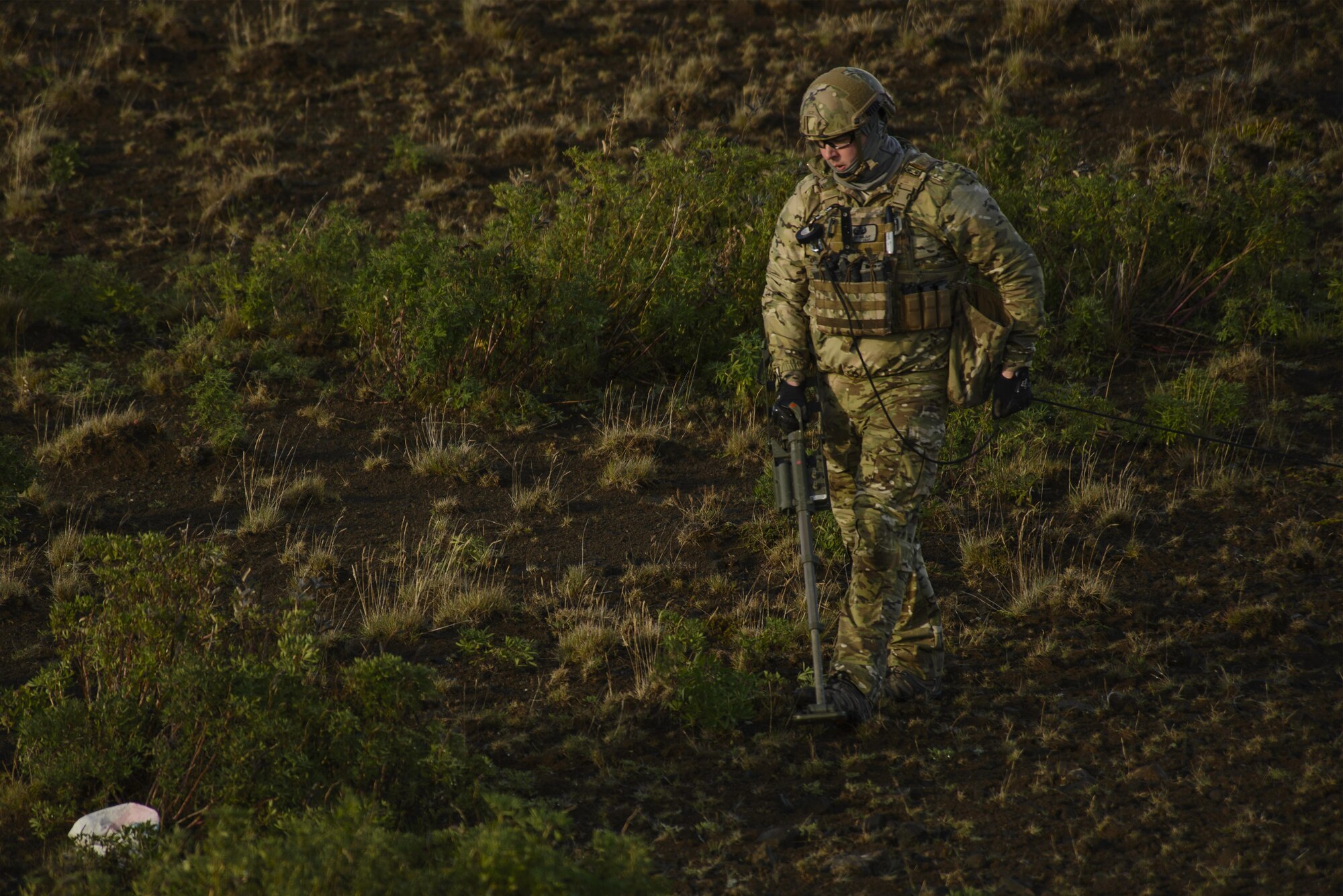 U.S. Air Force Tech. Sgt. Jason Umlauf, 52nd Civil Engineer Squadron explosive ordnance disposal craftsman, Spangdahlem Air Base, Germany, sweeps an area with a mine detector during Northern Challenge 16 exercise at Icelandic Coast Guard Keflavik Facility, Iceland, Sept. 19, 2016. The 52nd EOD, provides an operational explosive ordnance disposal capability to locate, identify, render safe, recover, field evaluate and dispose of all explosive ordnance. (U.S. Air Force photo by Staff Sgt. Jonathan Snyder)