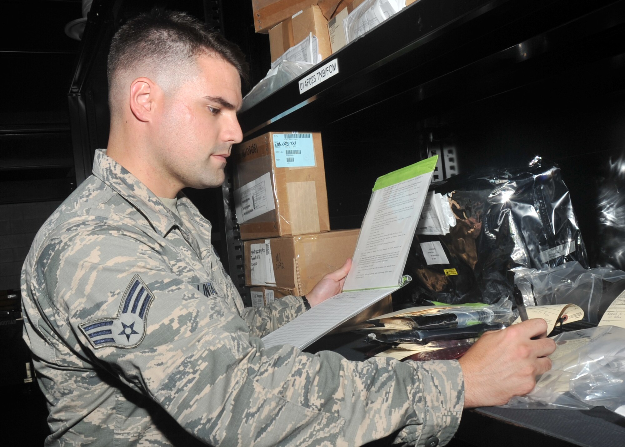 U.S. Air Force Senior Airman George Henry Lintala III, 325th Aircraft Maintenance Squadron supply journeyman, performs an aircraft part inventory check for at the 43rd Aircraft Munitions Unit on Tyndall AFB, Fla., Sept. 12, 2016. Lintala is a recent Airman Leadership School graduate and will promote to staff sergeant next year. (U.S. Air Force photo by Senior Airman Ty-Rico Lea/Released)