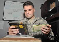 U.S. Air Force Senior Airman George Henry Lintala III, 325th Aircraft Maintenance Squadron supply journeyman, carefully identifies an aircraft part with its serial number code at the 43rd Aircraft Munitions Unit on Tyndall AFB, Fla., Sept. 12, 2016. In Airman Leadership School, Lintala learned the transformational leadership style of idealized Inspiration. Once he receives a subordinate, he plans practice this leadership style by demonstrating proper Air Force principles. (U.S. Air Force photo by Senior Airman Ty-Rico Lea/Released)