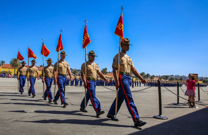 Drill instructors from Charlie Company, 1st Recruit Training Battalion, march in formation after receiving the guidons from the company honormen during the graduation ceremony at Marine Corps Recruit Depot San Diego, Sept. 16. Graduation takes place at the completion of a 13-week transformation including training in drill, marksmanship, basic combat skills and Marine Corps customs and traditions. Annually, more than 17,000 males recruited from the Western Recruiting Region are trained at MCRD San Diego.