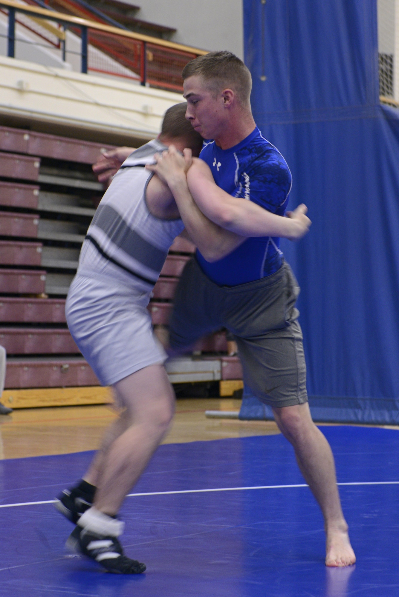 Service members participate in an intramural wrestling meet at the Joint Base Elmendorf-Richardson Buckner Fitness Center, Sept. 14, 2016. The participants were split into six different weight categories and medals were awarded to the top two in each category. 