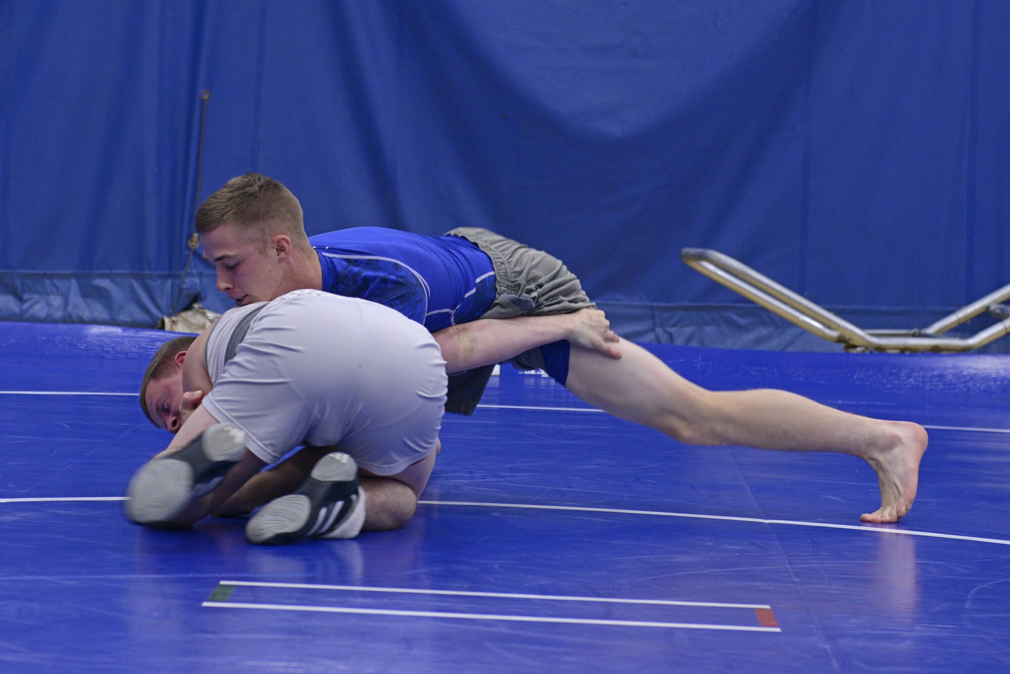 Service members participate in an intramural wrestling meet at the Joint Base Elmendorf-Richardson Buckner Fitness Center, Sept. 14, 2016. The participants were split into six different weight categories and medals were awarded to the top two in each category. 