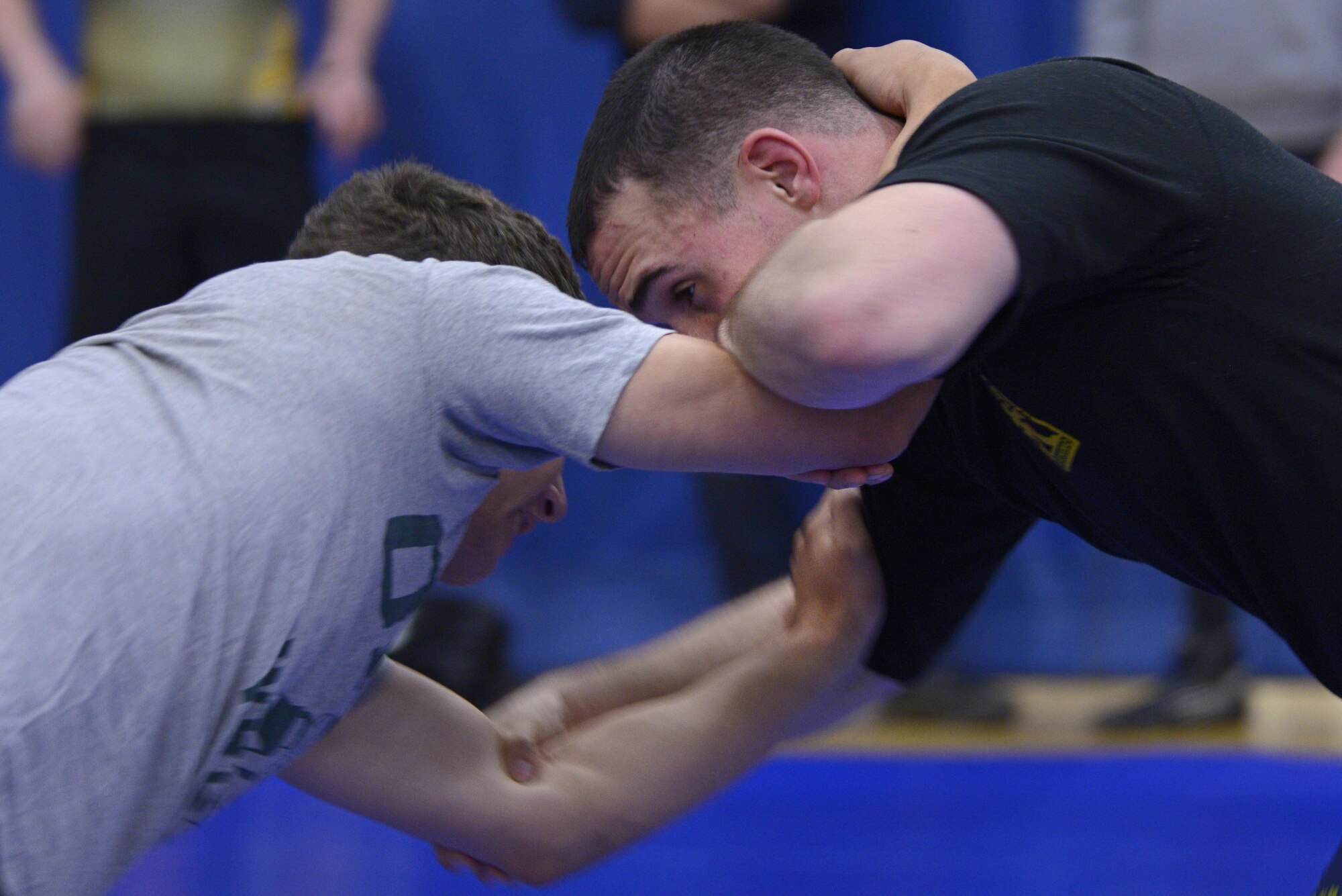 Service members participate in an intramural wrestling meet at the Joint Base Elmendorf-Richardson Buckner Fitness Center, Sept. 14, 2016. The participants were split into six different weight categories and medals were awarded to the top two in each category. 