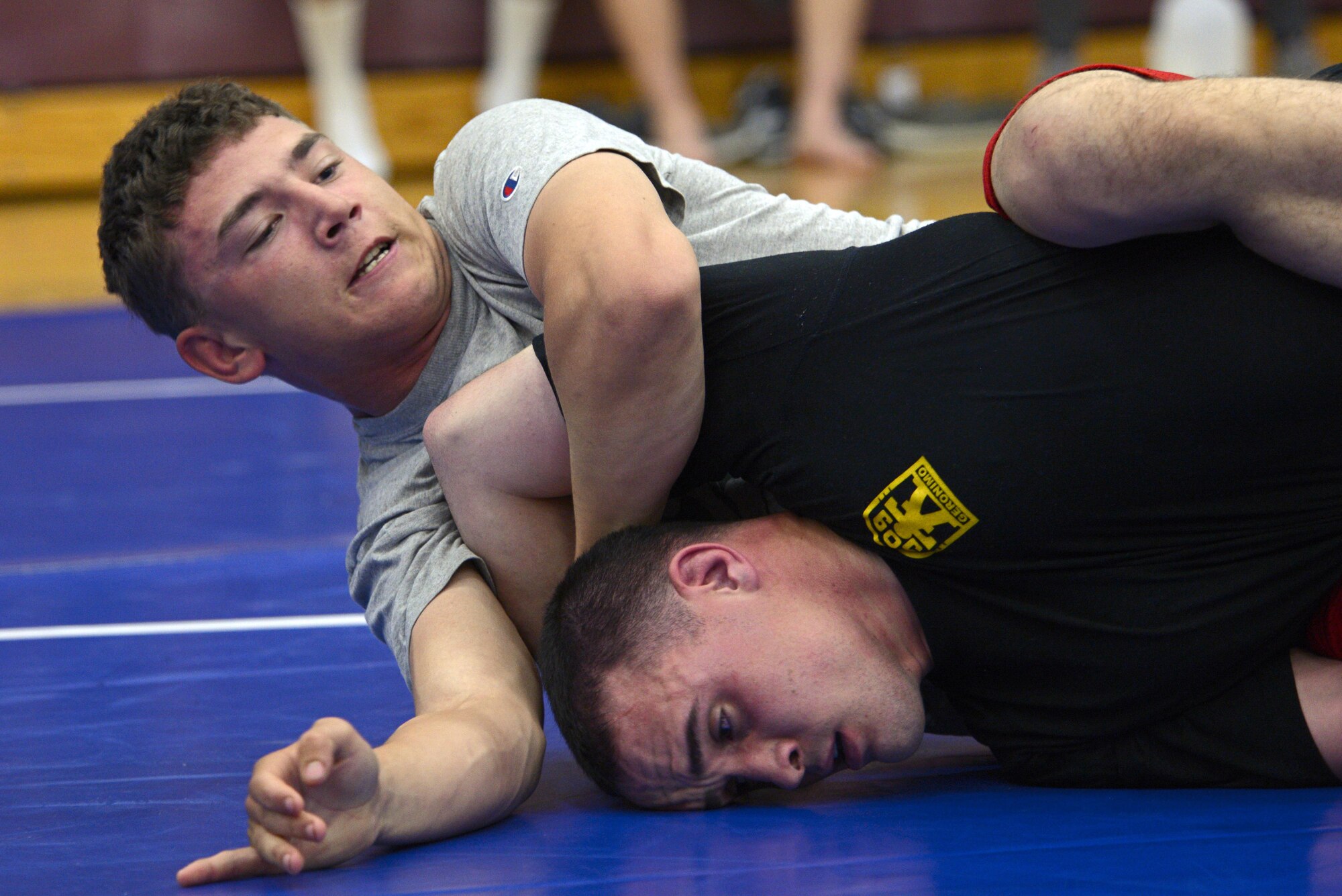 Isaiah Collier attempts to pin Wyatt Owen during an intramural wrestling meet at the Joint Base Elmendorf-Richardson’s Buckner Fitness Center, Sept. 14, 2016. The participants were split into six different weight categories, and medals were awarded to the top two in each category. Collier is assigned to the 1st Battalion, 501st Parachute Infantry Regiment, 4th Brigade Combat Team (Airborne), 25th Infantry Division and Owen is assigned to the 3rd Battalion, 509th Parachute Infantry Regiment, 4th Infantry Brigade Combat Team (Airborne), 25th Infantry Division. 