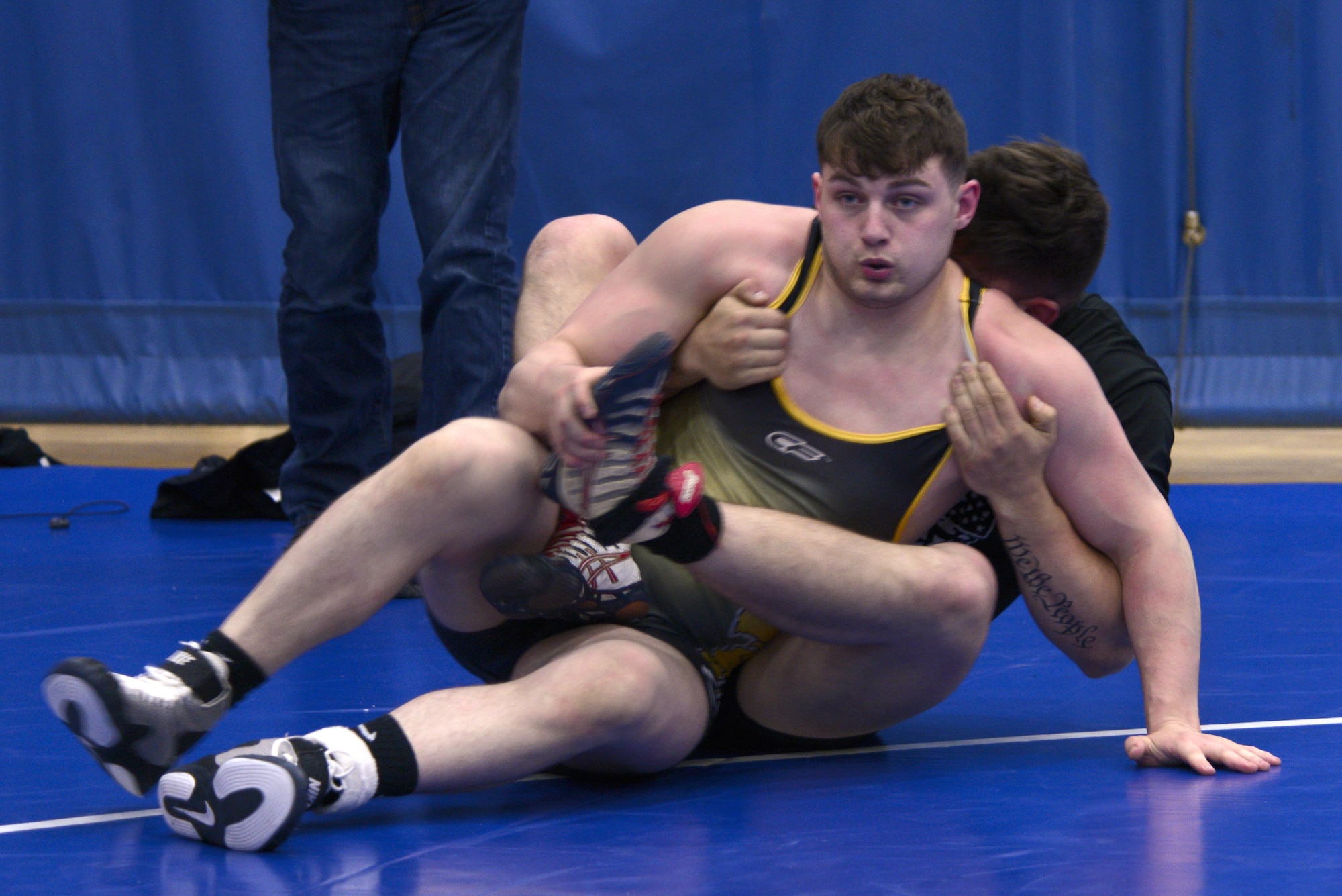 Dillon Brush, front, and Matthew Lopez, back, compete in an intramural wrestling meet at the Joint Base Elmendorf-Richardson’s Buckner Fitness Center, Sept. 14, 2016. The participants were split into six different weight categories, and medals were awarded to the top two in each category. Brush is assigned to the 673d Force Support Squadron and Lopez is assigned to the 2nd Battalion, 377th Parachute Field Artillery Regiment, 4th Brigade Combat Team (Airborne), 25th Infantry Division.