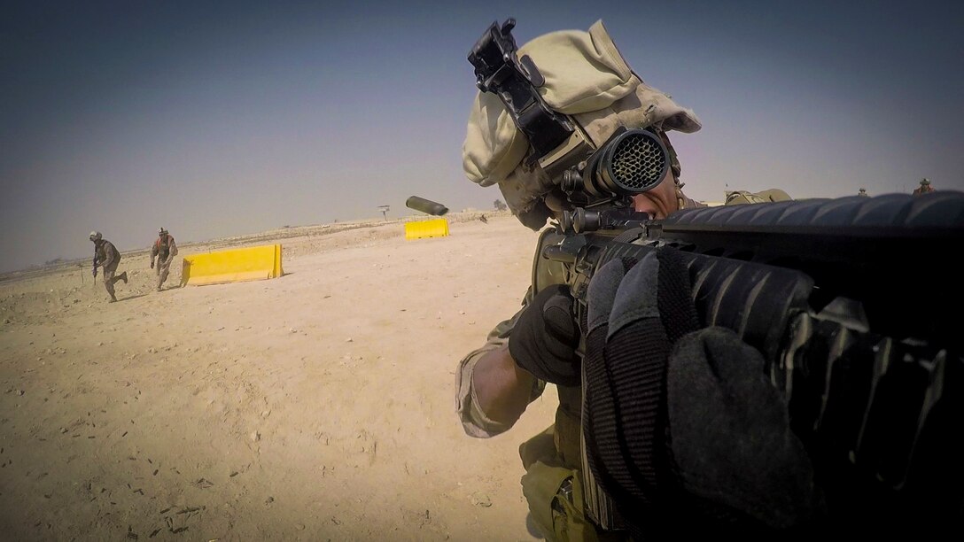 Cpl. Christopher Truax, a team leader with Security Forces Company, Marine Wing Support Squadron-373, Special Purpose Marine Air Ground Task Force-Crisis Response-Central Command, participates in a live-fire and maneuver range while forward deployed, July 18, 2016. The company is made up of Marines from a variety of backgrounds outside of Marine Corps infantry. “We get to see where we’re at as a fire team,” said the food service specialist, of Horseheads, N.Y. “We also get to communicate well; focus on the sounds of each other and how each member moves.” The course of fire requires teams of Marines to engage multiple targets as they make their approach. This is intended to simulate moving toward a possible threat. SPMAGTF – CR – CC is a self-sustaining expeditionary unit, designed to provide a broad range of crisis response capabilities throughout the Central Command area of responsibility, using organic aviation, logistical, and ground combat assets. (Photo by Cpl. Danielle Rodrigues/ Released)