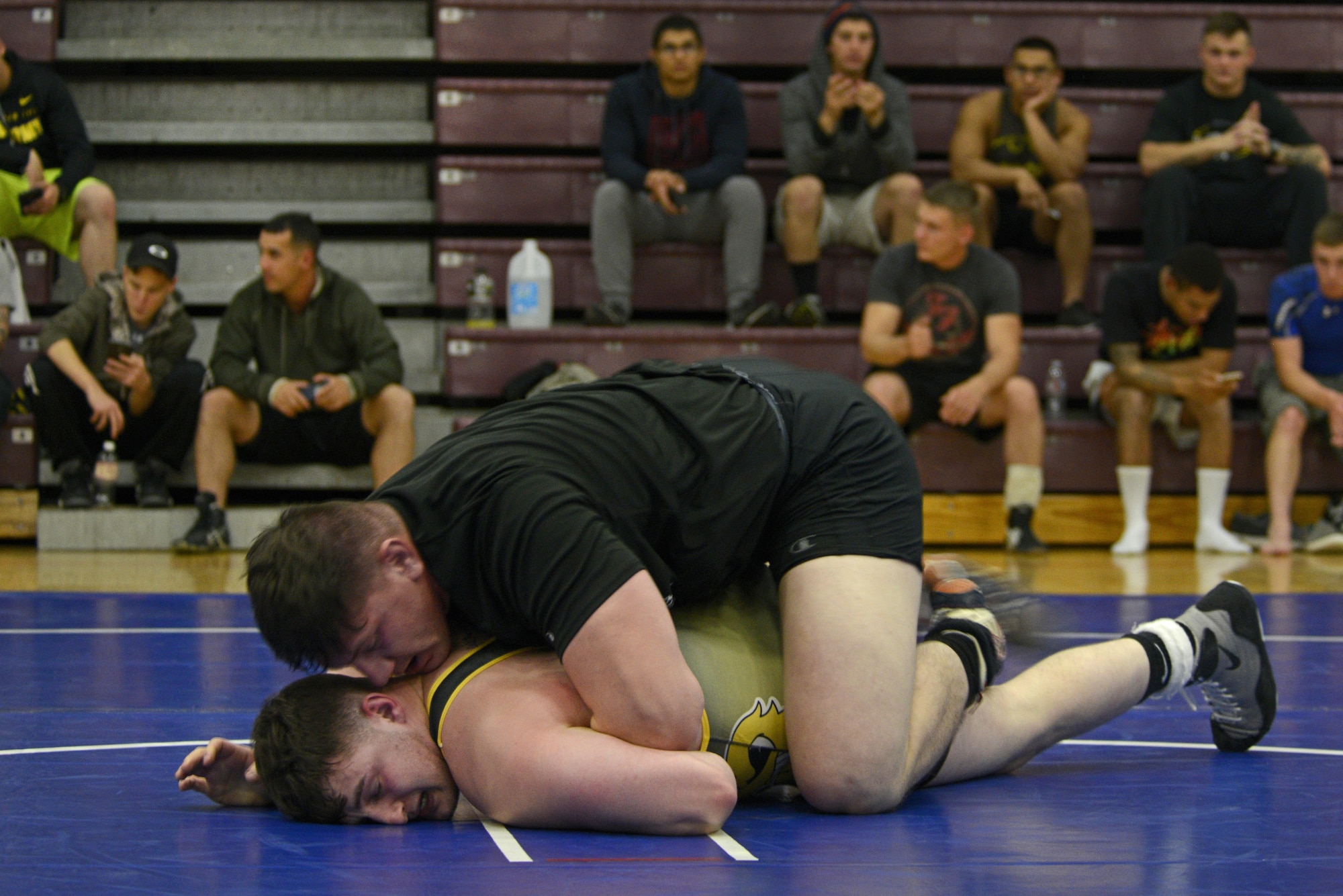 Matthew Lopez, top, attempts to pin Dillon Brush, bottom, during an intramural wrestling meet at the Joint Base Elmendorf-Richardson’s Buckner Fitness Center, Sept. 14, 2016. The participants were split into six different weight categories, and medals were awarded to the top two in each category. Lopez is assigned to the 2nd Battalion, 377th Parachute Field Artillery Regiment, 4th Brigade Combat Team (Airborne), 25th Infantry Division, and Brush is assigned to the 673d Force Support Squadron. 