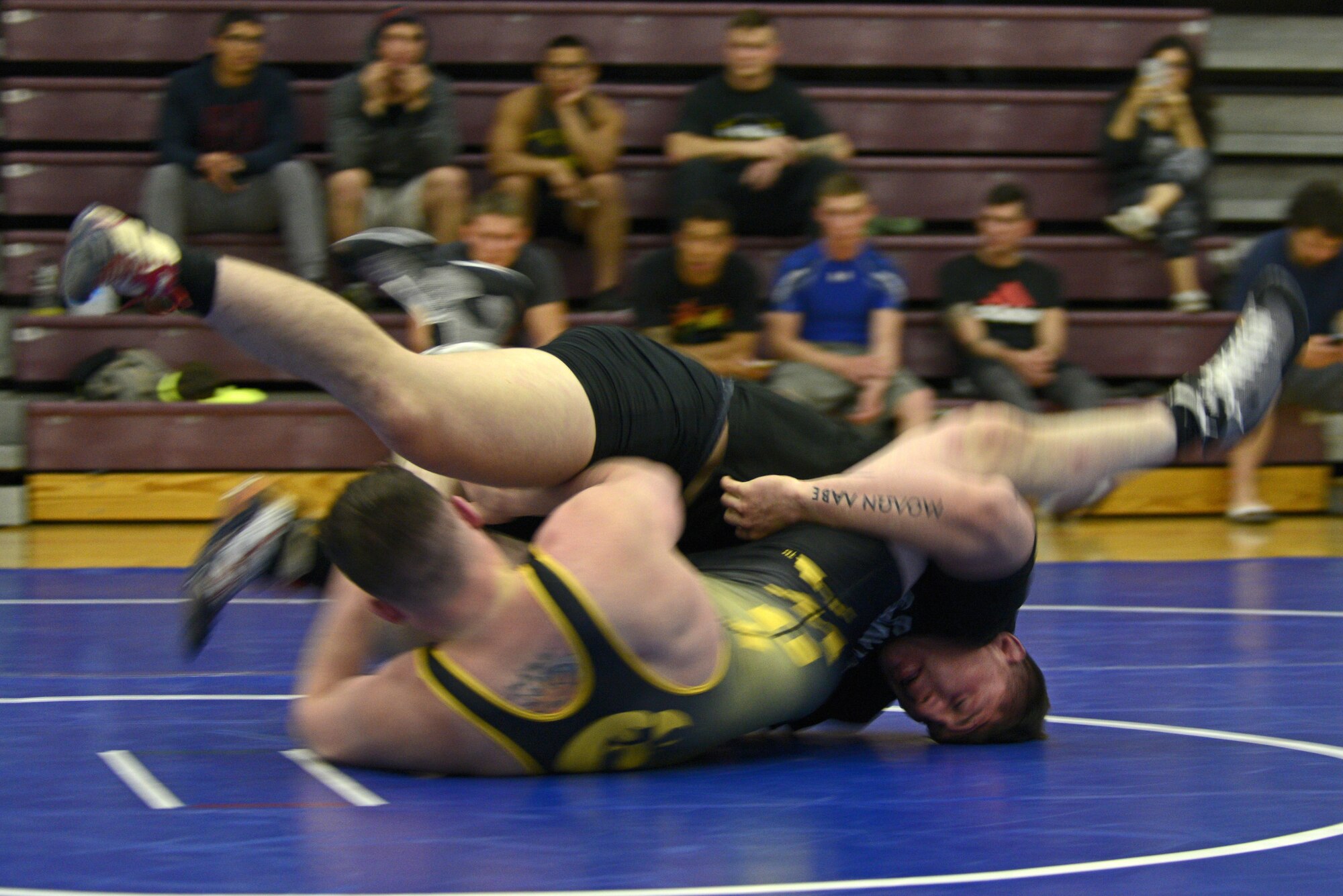 Dillon Brush, left, and Matthew Lopez, right, compete in an intramural wrestling meet at the Joint Base Elmendorf-Richardson’s Buckner Fitness Center, Sept. 14, 2016. The participants were split into six different weight categories, and medals were awarded to the top two in each category. Brush is assigned to the 673d Force Support Squadron and Lopez is assigned to the 2nd Battalion, 377th Parachute Field Artillery Regiment, 4th Brigade Combat Team (Airborne), 25th Infantry Division. 