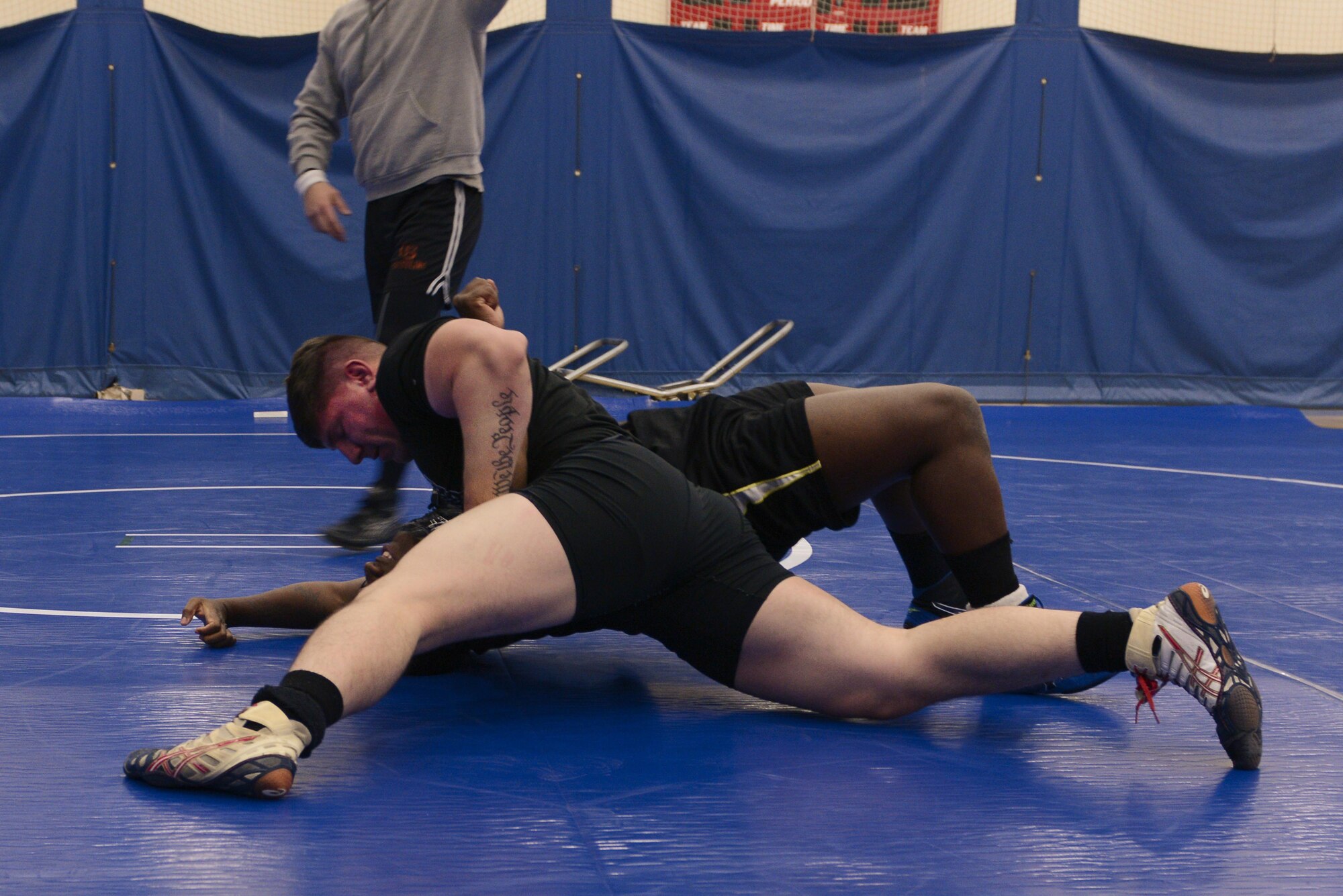 Matthew Lopez attempts to pin Charles Paylor during an intramural wrestling meet at the Joint Base Elmendorf-Richardson’s Buckner Fitness Center, Sept. 14, 2016. The participants were split into six different weight categories, and medals were awarded to the top two in each category. Lopez is assigned to the 2nd Battalion, 377th Parachute Field Artillery Regiment, 4th Brigade Combat Team (Airborne), 25th Infantry Division, and Paylor is assigned to the 3rd Battalion, 509th Parachute Infantry Regiment, 4th Infantry Brigade Combat Team (Airborne), 25th Infantry Division.