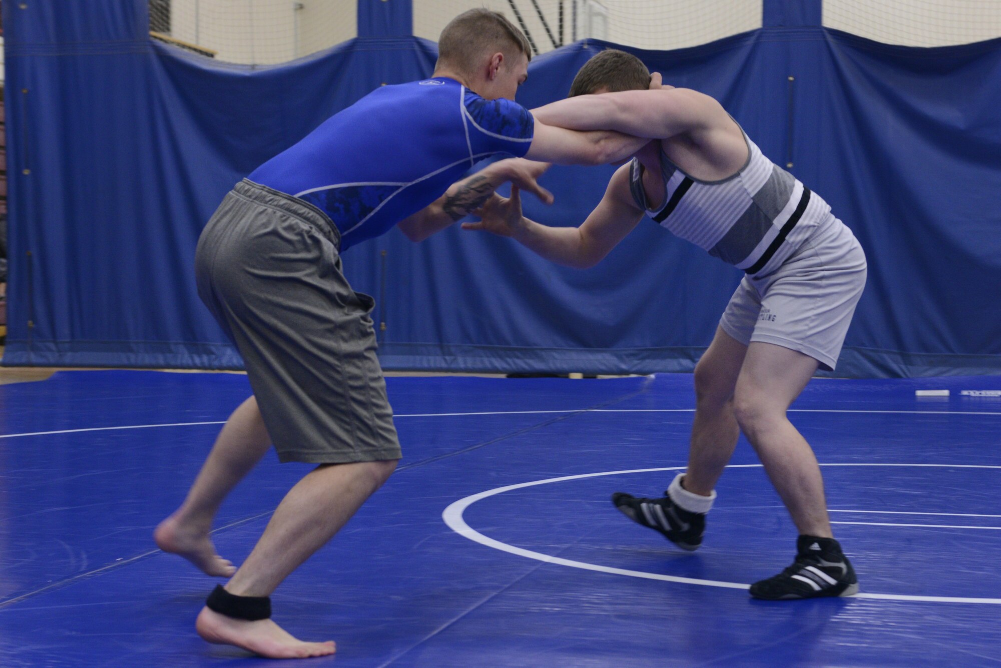 Service members participate in an intramural wrestling meet at the Joint Base Elmendorf-Richardson Buckner Fitness Center, Sept. 14, 2016. The participants were split into six different weight categories and medals were awarded to the top two in each category. 