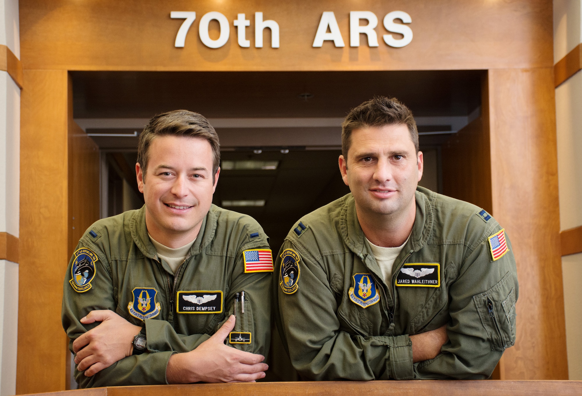 Capt. Jared Wahleithner (right) and 1st Lt. Christopher Dempsey, KC-10 Extender pilots with the 70th Air Refueling Squadron, used years of aircrew survival and first aid and buddy care training to help rescue an aircraft crash victim Sept. 17, 2016. The Citizen Airmen were taking part in the annual Clear Lake Splash In at Clear Lake, Calif., when a seaplane crashed during an attempted water landing. (U.S. Air Force photo by Ken Wright)