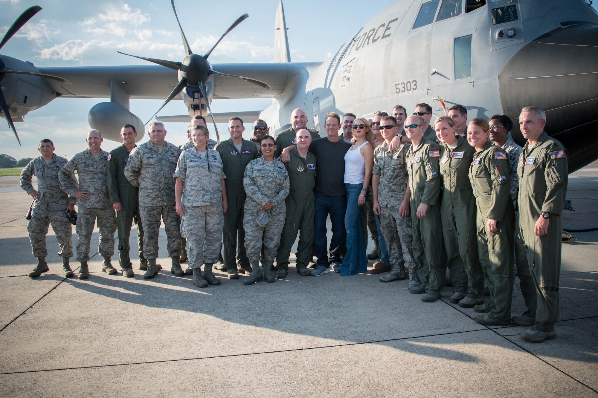Director Peter Berg and actors Kurt Russell and Kate Hudson pose for a photo with 403rd Wing Airmen during a visit to Keesler Air Force Base Sept. 10 as part of a prescreening of their new film, Deepwater Horizon. (U.S. Air Force photo/Senior Airman Heather Heiney)