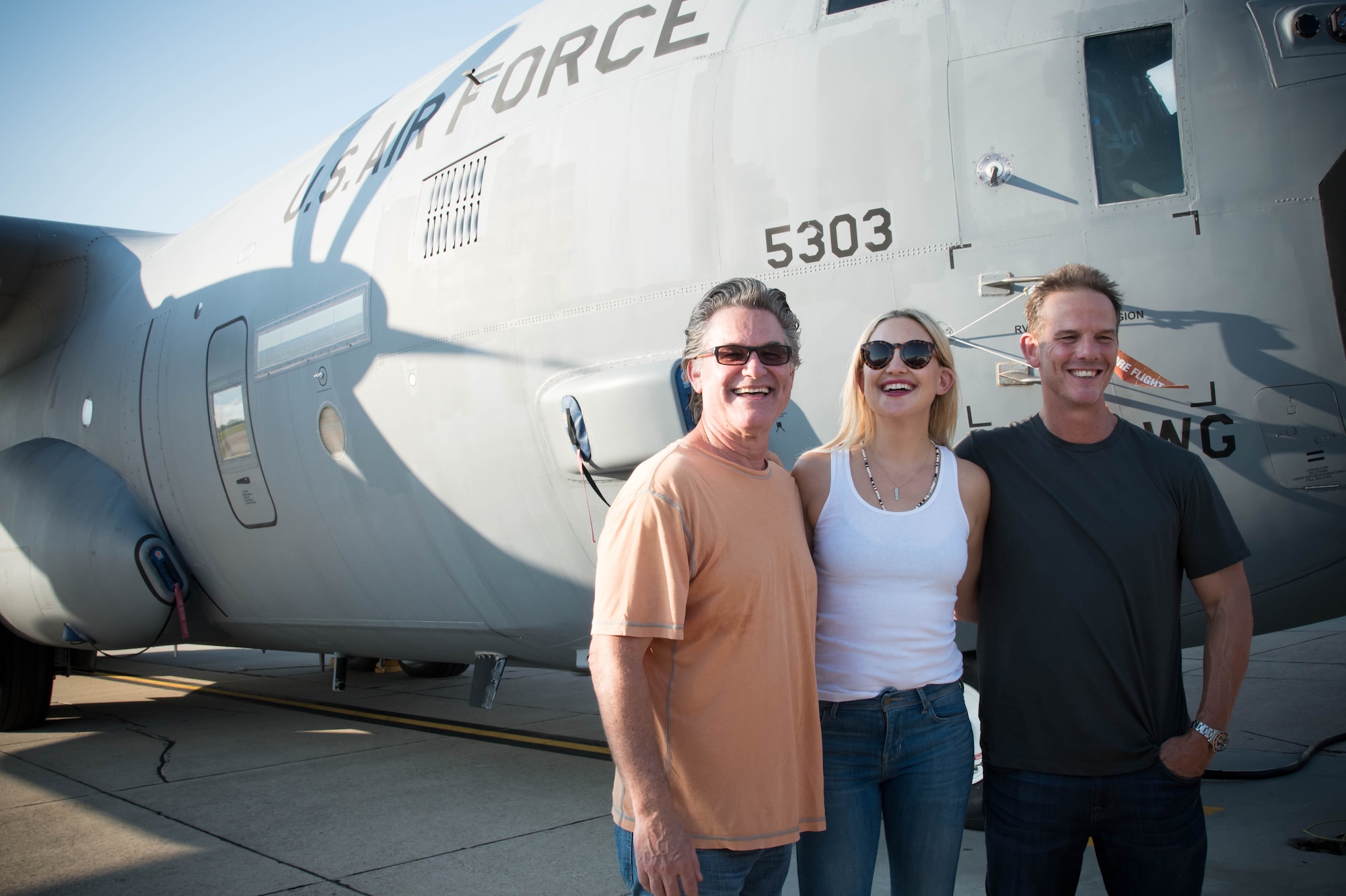 Director Peter Berg and actors Kurt Russell and Kate Hudson pose for a photo during their visit to Keesler Air Force Base Sept. 10 as part of a prescreening of their new film, Deepwater Horizon. (U.S. Air Force photo/Senior Airman Heather Heiney)