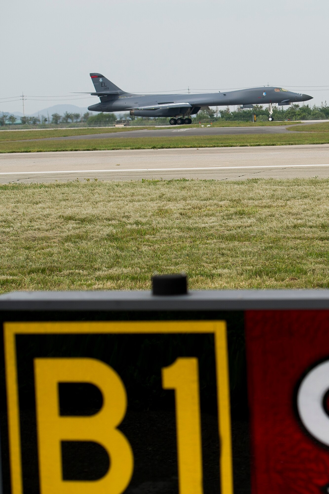 A U.S. Air Force B-1B Lancer, deployed from Andersen Air Base, Guam, lands at Osan Air Base, Republic of Korea, Sept. 21, 2016, as a strategic display of airpower. Today marks the first time the airframe has landed on the Korean peninsula in 20 years, as well as conducting the closest flight near North Korea ever. The B-1 is the backbone of the U.S. long-range bomber mission and is capable of carrying the largest payload of both guided and unguided weapons in the Air Force inventory. (U.S. Air Force photo by Staff Sgt. Jonathan Steffen)