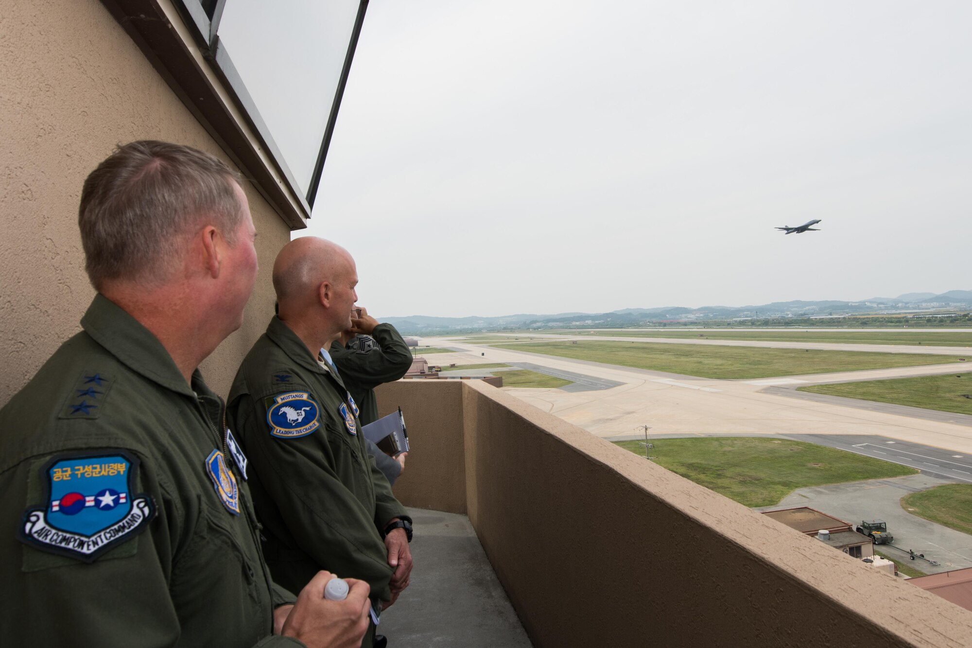 The low level  flight of a B-1B Lancer is tracked by Lt. Gen. Thomas W. Bergeson, 7th Air Force commander, and Col. Andrew Hansen, 51st Fighter Wing commander, at Osan Air Base, Republic of Korea. Sept. 21, 2016. The B-1 is the backbone of the U.S. long-range bomber mission and is capable of carrying the largest payload of both guided and unguided weapons in the Air Force inventory. The flight was the closest a B-1 has ever flown to the border between the Republic of Korea and North Korea. (U.S. Air Force photo by Senior Airman Dillian Bamman)