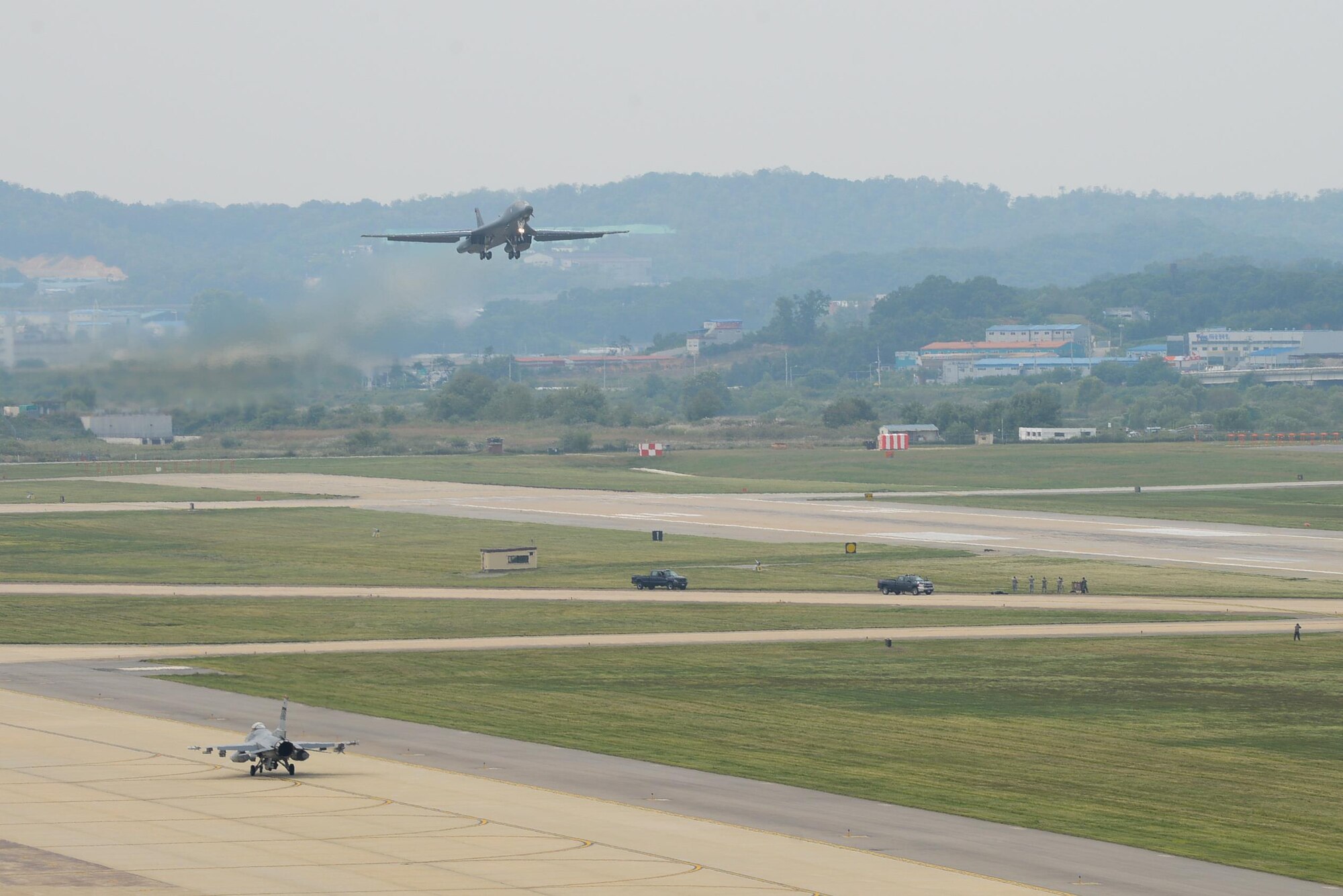 A B-1B Lancer assigned to Andersen Air Base, Guam, performs a low level flight over Osan Air Base, Republic of Korea, Sept. 21, 2016. The B-1 is the backbone of the U.S. long-range bomber mission and is capable of carrying the largest payload of both guided and unguided weapons in the Air Force inventory. The flight was the closest a B-1 has ever flown to the border between the Republic of Korea and North Korea. (U.S. Air Force photo by Senior Airman Dillian Bamman)