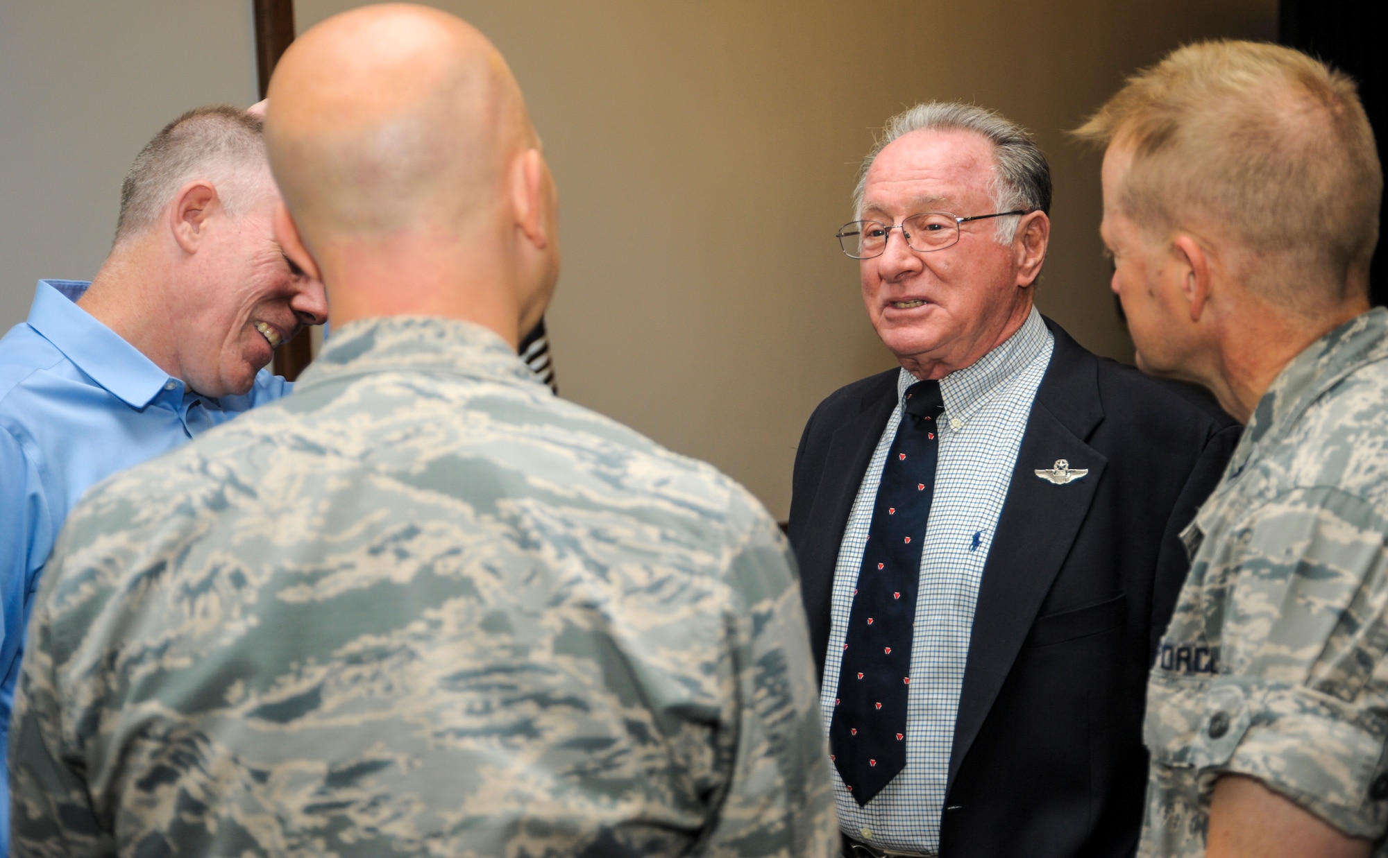 Retired U.S. Air Force Lt. Col. Melvin Pollack speaks with members of Team Ramstein before the POW/MIA Recognition Day luncheon Sept. 16, 2016, at Ramstein Air Base, Germany. Pollack spent 2,068 days as a POW during the Vietnam War. (U.S. Air Force photo/Staff Sgt. Timothy Moore)