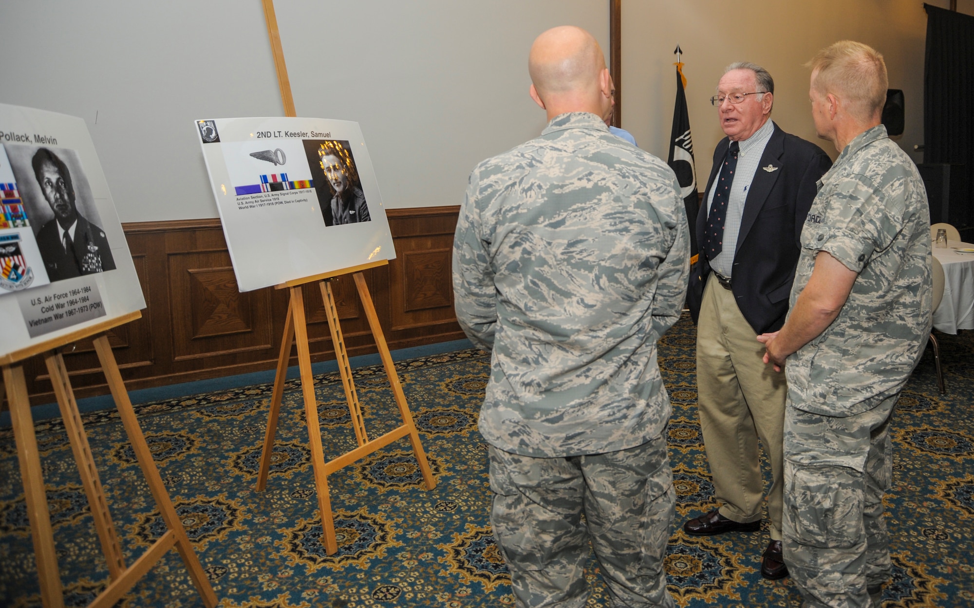 Retired U.S. Air Force Lt. Col. Melvin Pollack speaks with members of Team Ramstein before the POW/MIA Recognition Day luncheon Sept. 16, 2016, at Ramstein Air Base, Germany. Pollack spent 2,068 days as a POW during the Vietnam War. (U.S. Air Force photo/Staff Sgt. Timothy Moore)