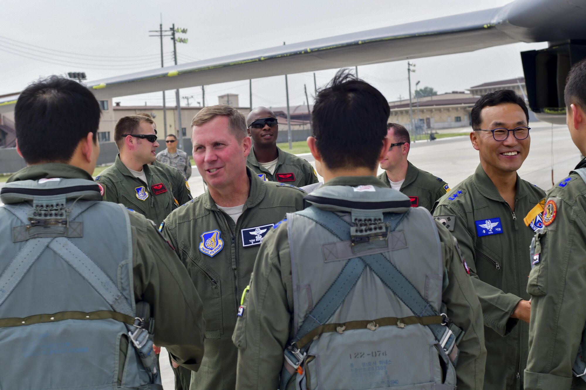 Lt. Gen. Thomas W. Bergeson, 7th Air Force commander, and Republic of Korea air force Maj. Gen. Hong, Jae Ki, Republic of Korea Air Forces Operations Center vice commander, greet F-15K Slam Eagle pilots after a mission escorting a U.S. Air Force B-1B Lancer to Osan Air Base, Republic of Korea, Sept. 21, 2016. The B-1, which is the operational backbone of the U.S. long-range bomber mission, had just conducted its closest flight to the North Korean border ever. (U.S. Air Force photo by Senior Airman Victor J. Caputo)