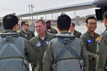 Lt. Gen. Thomas W. Bergeson, 7th Air Force commander, and Republic of Korea air force Maj. Gen. Hong, Jae Ki, Republic of Korea Air Forces Operations Center vice commander, greet F-15K Slam Eagle pilots after a mission escorting a U.S. Air Force B-1B Lancer to Osan Air Base, Republic of Korea, Sept. 21, 2016. The B-1, which is the operational backbone of the U.S. long-range bomber mission, had just conducted its closest flight to the North Korean border ever. (U.S. Air Force photo by Senior Airman Victor J. Caputo)