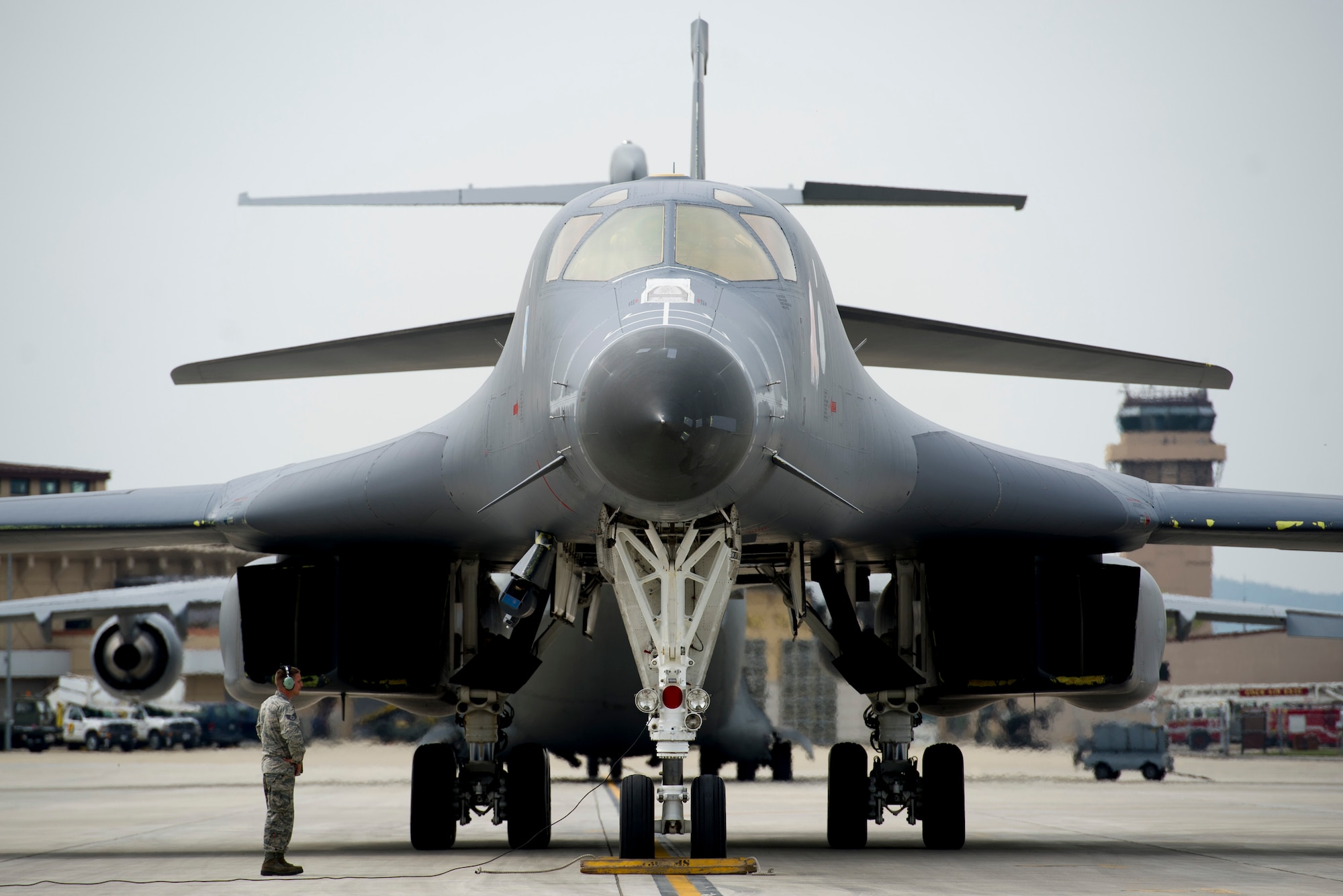 U.S. Air Force Staff Sgt. Cody Owens, 28th Aircraft Maintenance Squadron flight controls journeymen, awaits engine shut-down of a U.S. Air Force B-1B Lancer deployed from Andersen Air Base, Guam, at Osan Air Base, Republic of Korea, Sept. 21, 2016. Today, the Lancer conducted the closest flight to North Korea ever. The B-1 is the backbone of the U.S. long-range bomber mission and is capable of carrying the largest payload of both guided and unguided weapons in the Air Force inventory. (U.S. Air Force photo by Staff Sgt. Jonathan Steffen)